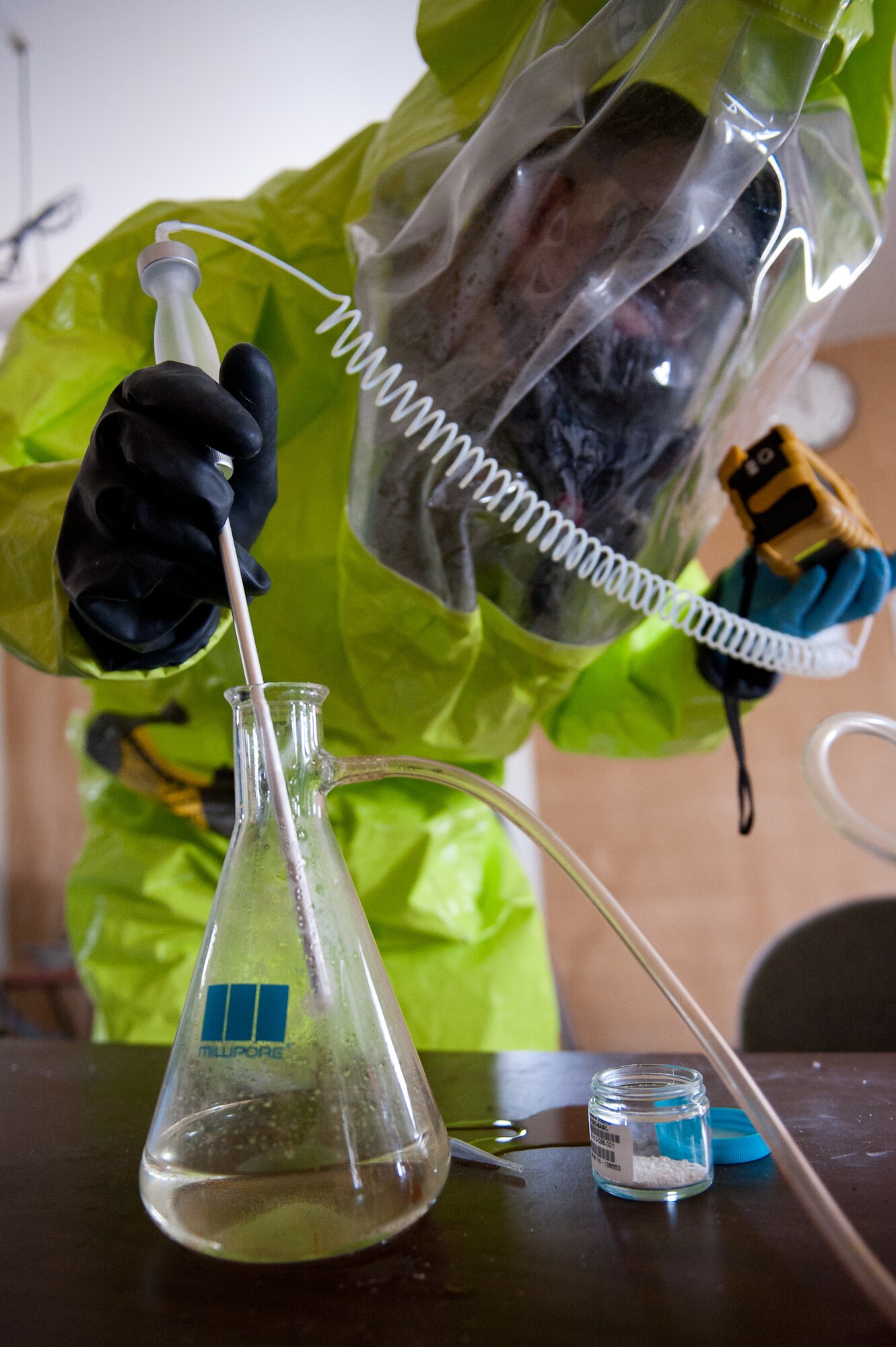 Airman 1st Class Jeremy Harrison, 28th Civil Engineer Squadron emergency management journeyman, uses a multi-ray gas detector to test unknown substances for potentially hazardous properties during a training exercise at Ellsworth Air Force Base, S.D., Jan. 20, 2012. Emergency management trains for real-world scenarios by using an array of instruments to test and monitor a wide variety of hazardous material. (U.S.  Air Force photo by Airman 1st Class Kate Thornton/Released)