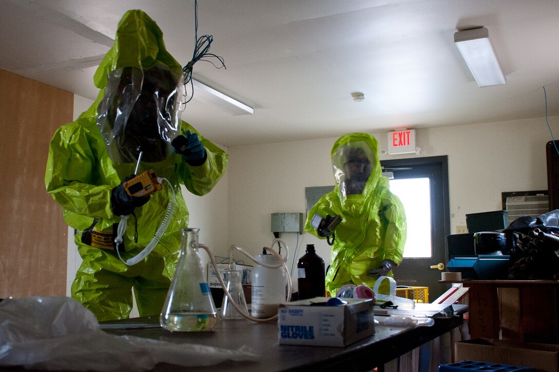 Airman 1st Class Jeremy Harrison and Senior Airman Matthew Hung, 28th Civil Engineer Squadron emergency management journeymen, use multi-ray gas detectors during a training exercise at Ellsworth Air Force Base, S.D., Jan. 20, 2012. Emergency management performs monthly exercises based on real-world scenarios to ensure Airmen stay prepared in the event of an actual emergency. (U.S.  Air Force photo by Airman 1st Class Kate Thornton/Released)