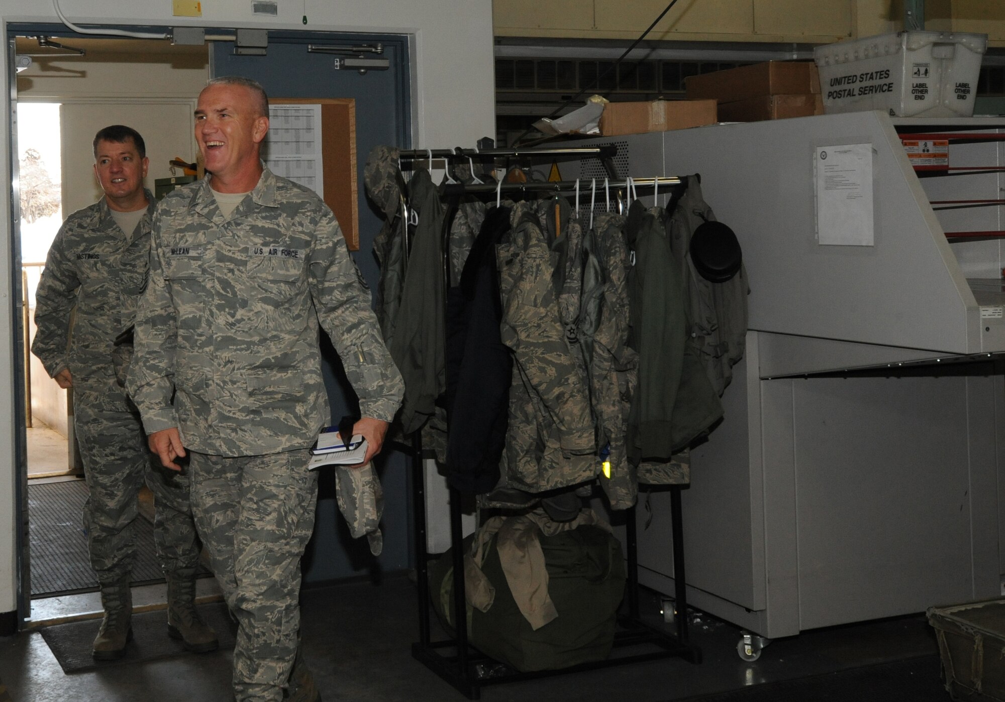 MISAWA AIR BASE, Japan – Chief Master Sgt. Brooke McLean, Pacific Air Forces command chief, walks into the base post office, Jan. 25. McLean visited Misawa Air Base to guest speak at the Chief Recognition Ceremony and tour various units on base. McLean’s responsibilities include advising the PACAF commander on all matters affecting the readiness, training, professional development and effective utilization of assigned enlisted personnel. McLean also coordinates with the headquarters staff, commanders, senior personnel on administration and implementation of command policy. (U.S. Air Force photo/Airman Kenna Jackson)