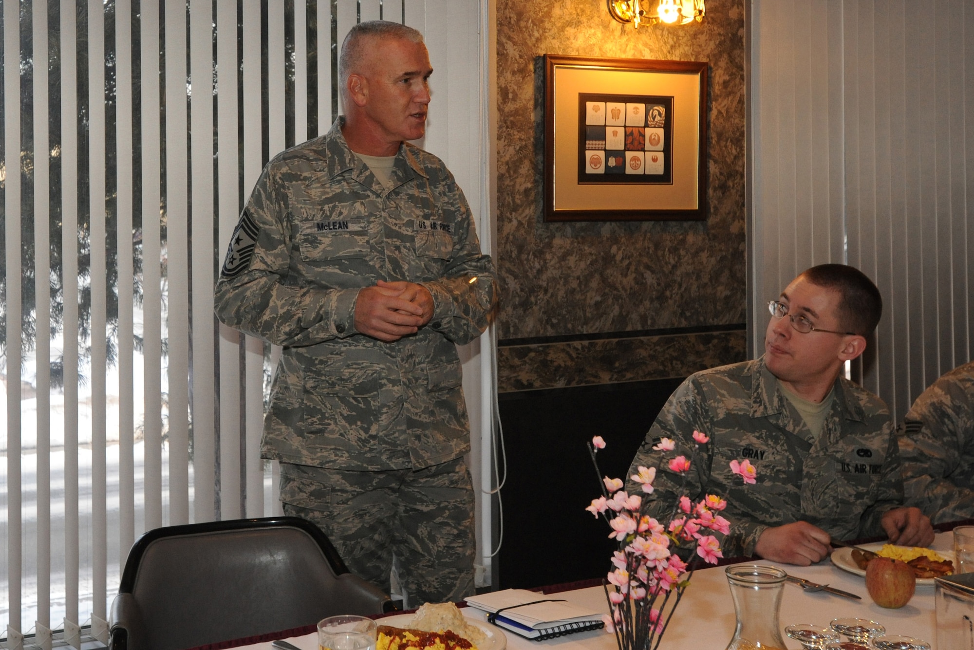 MISAWA AIR BASE, Japan – Chief Master Sgt. Brooke McLean, Pacific Air Forces command chief, speaks to Airmen during breakfast at the Grissom Dining Facility, Jan. 25. McLean visited Misawa Air Base to guest speak at the Chief Recognition Ceremony and tour various units on base. McLean’s responsibilities include advising the PACAF commander on all matters affecting the readiness, training, professional development and effective utilization of assigned enlisted personnel. McLean also coordinates with the headquarters staff, commanders, senior personnel on administration and implementation of command policy. (U.S. Air Force photo/Airman Kenna Jackson)
