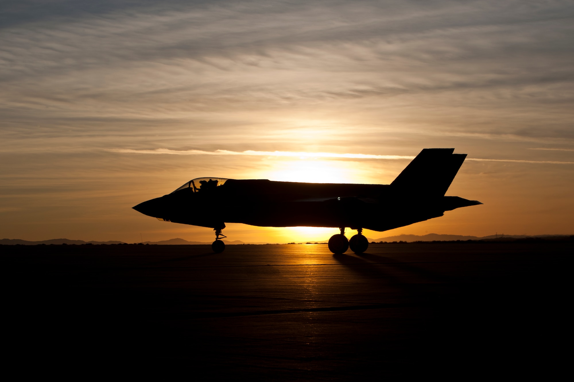 Mark Ward, Lockheed Martin test pilot, waits to take off in AF-6 to pilot the F-35A’s first-ever night flight, Jan. 18 at Edwards. The 461st Flight Test Squadron and the Joint Strike Fighter Integrated Test Force began the test at sunset and flew into the night. (Lockheed Martin photo by Paul Weatherman)