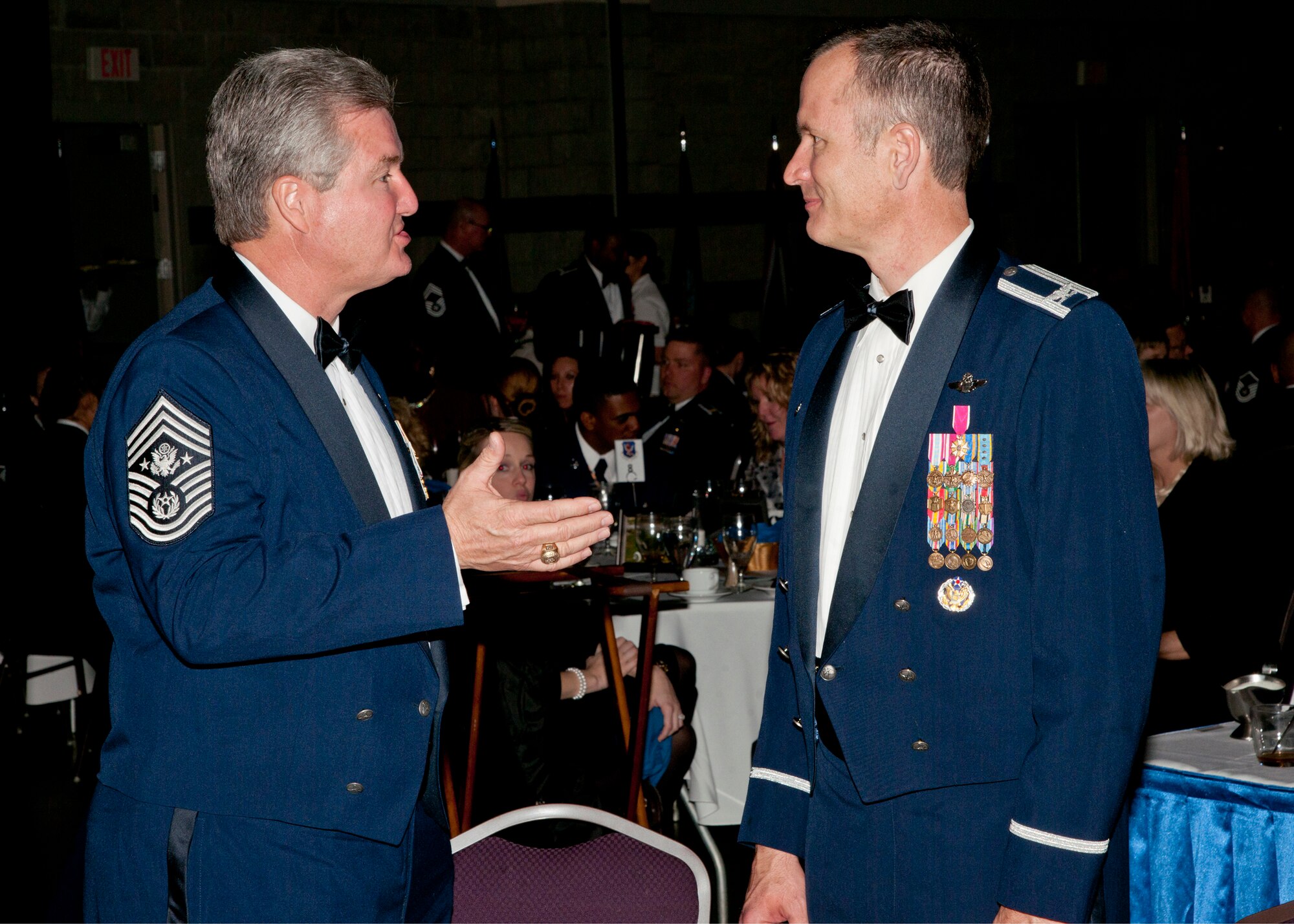 Chief Master Sgt. of the Air Force #14 (Ret.) Gerald Murray speaks with Col. Billy Thompson 23d Wing commander during the Annual Awards Banquet at the James H. Rainwater Conference Center in Valdosta, Ga., Jan. 28, 2012. Murray spent a portion of his career at Moody as a maintenance superintendant with the 70th Fighter Squadron and as well as the command chief for the wing. (U.S. Air Force photo by Airmen 1st Class Paul Francis/Released)
