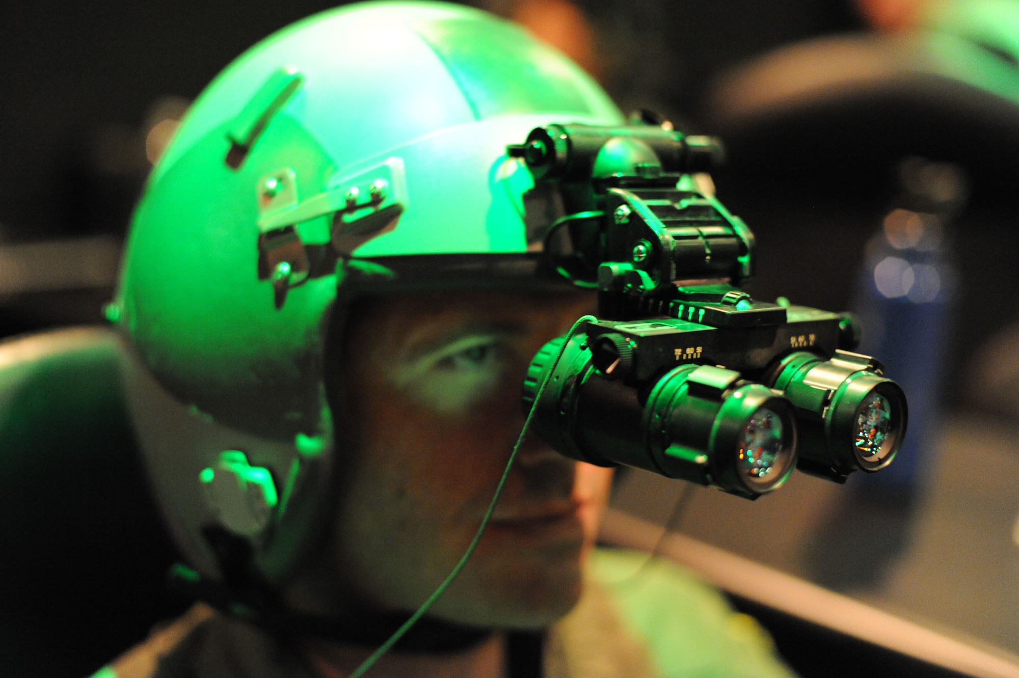 2nd Lt. Michael Vastola, 359th Aerospace Medicine Squadron OIC of Logistics Element,  aligns his night vision goggles during a NVG Academic Instructors Course held at the Aerospace Physiology building on Joint Base San Antonio-Randolph Jan. 25. (U.S. Air Force photo/Rich McFadden) (released)