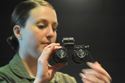 Lt. Shannon Scannon, 359th Aerospace Medicine Squadron OIC of academics and training, demonstrates how to align night vision goggles during a NVG Academic Instructors Course held at the Aerospace Physiology building on Joint Base San Antonio-Randolph Jan. 25. (U.S. Air Force photo/Rich McFadden) (released)