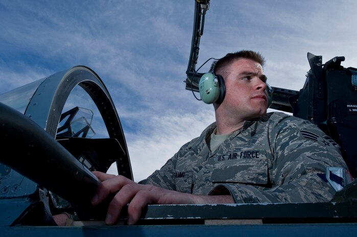 U.S. Air Force Senior Airman Benjamin Digiammo, 104th Fighter Wing, Massachusetts Air National Guard, conducts pre-flight maintenance in the cockpit of an F-15 E Strike Eagle during Red Flag 12-2 Jan. 24, 2012, at Nellis Air Force Base, Nev. Red Flag is a realistic combat training exercise involving the air forces of the United States and its allies. The exercise includes units from Nevada, Colorado, South Dakota, Louisiana, Utah, California, Republic of Korea, Kingdom of Saudi Arabia, Massachusetts and Oklahoma. (U.S. Air Force photo by Airman 1st Class Daniel Hughes)