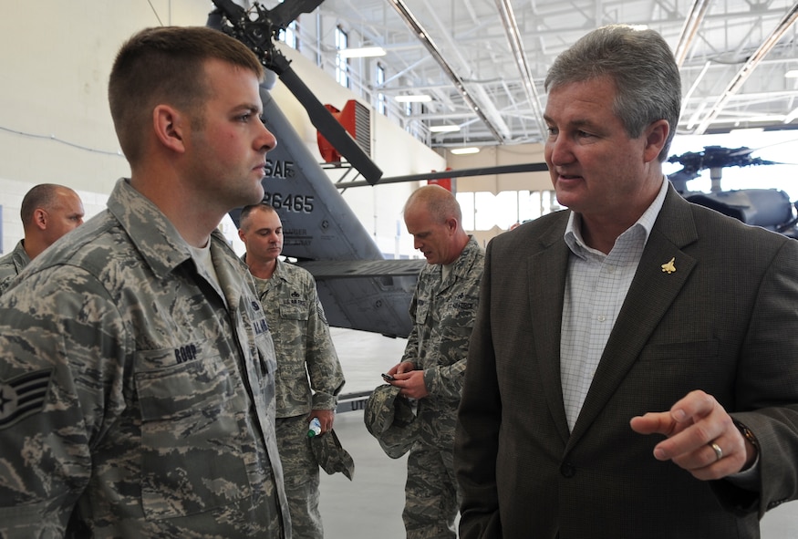 Retired Chief Master Sgt. of the Air Force Gerald R. Murray speaks to Staff Sgt. Charles Boop, 23d Aircraft Maintenance Squadron crew chief, during a static display at Moody Air Force Base, Ga., Jan. 27, 2012. Murray has a background of various duties in aircraft maintenance. (U.S. Air Force photo by Airman 1st Class Olivia Dominique/Released)
