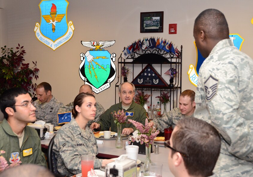 Maj. Gen. James Poss, center, assistant deputy chief of staff for intelligence, surveillance and reconnaissance, Headquarters U.S. Air Force, speaks to enlisted intelligence personnel from the 461st and 116th Air Control Wings during a breakfast at the Wynn Dining Facility, Robins Air Force Base, Ga., Jan. 26, 2012.  Poss met with intelligence personnel at Robins during a two-day  intelligence organizations site visit. (National Guard photo by Master Sgt. Roger Parsons/Released)