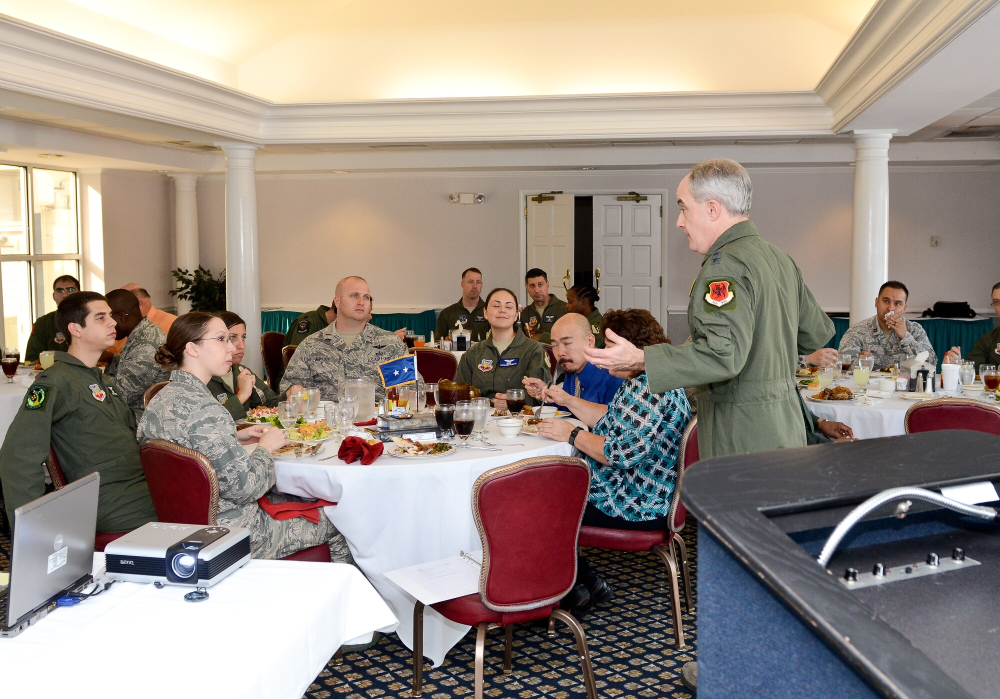 Maj. Gen. James Poss, standing, assistant deputy chief of staff for intelligence, surveillance and reconnaissance, Headquarters U.S. Air Force, speaks to intelligence officers and civilians during a lunch at the Horizon's Club, Robins Air Force Base, Ga., Jan. 26, 2012.  Poss met with intelligence personnel at Robins during a two-day  intelligence organizations site visit.   (National Guard photo by Master Sgt. Roger Parsons/Released)