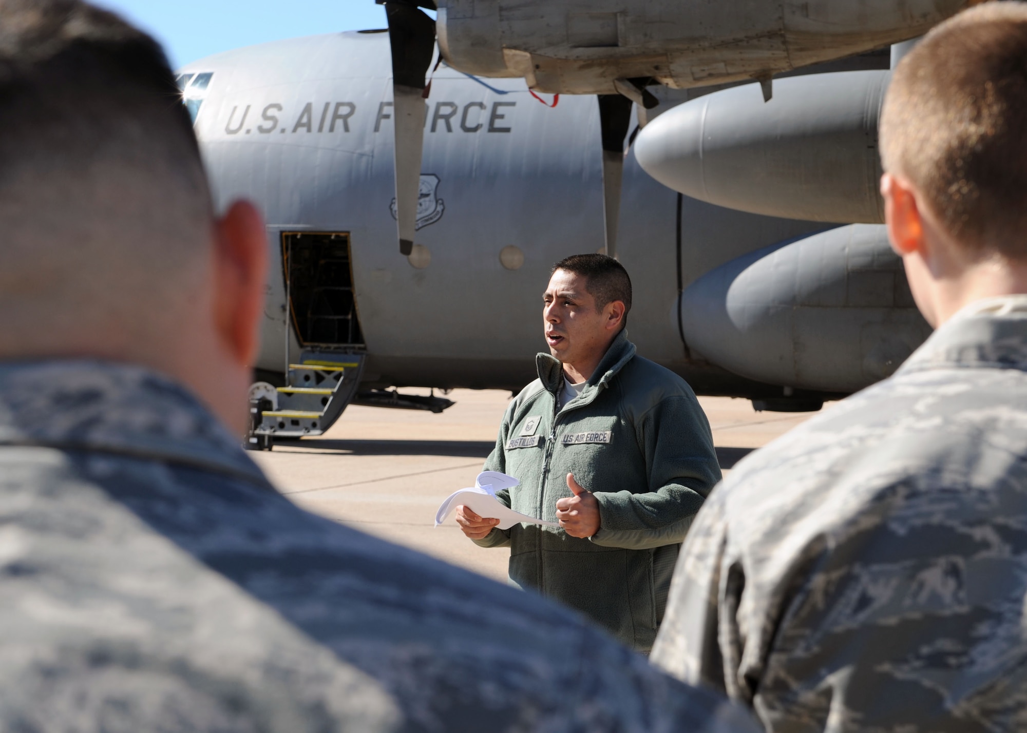 U.S. Air Force Master Sgt. Porfirio Bustillos, 317th Maintenance Operations Squadron, talks to 317th Airlift Group airmen about the importance of C-130 safety during the 317 AG’s Safety Day, Jan. 27, 2012, at Dyess Air Force Base, Texas.  During Safety Day, hands on safety demonstrations and briefings were given to highlight and correct past safety violations. (U.S. Air Force photo by Airman 1st Class Jonathan Stefanko/Released)