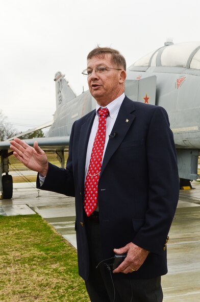 Retired Col. Charles DeBellevue speaks to media in front of an F-4D Phantom at the Museum of Aviation, Robins Air Force Base, Ga., Jan. 20, 2012.  DeBellevue earned more kills than any U.S. aviator in the Vietnam War as a Weapons Systems Officer in the F-4.  He met with media while visiting Robins as the guest speaker for the 116th and 461st Air Control Wing's annual award banquet.  (National Guard photo by Master Sgt. Roger Parsons/Released)