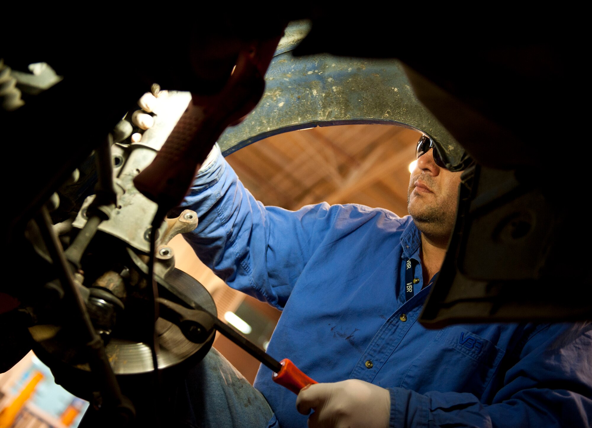 Ramazan Subasi, 39th Logistics Readiness Squadron, performs maintenance on a truck Jan. 26, 2012. Vehicle maintenance performs maintenance on all U.S. government motor vehicles and equipment assigned to Incirlik. They perform scheduled inspections and services, preventive maintenance and any repairs required to maintain the vehicle or equipment in a safe and serviceable condition. (U.S. Air Force photo by Senior Airman Clayton Lenhardt/Released)