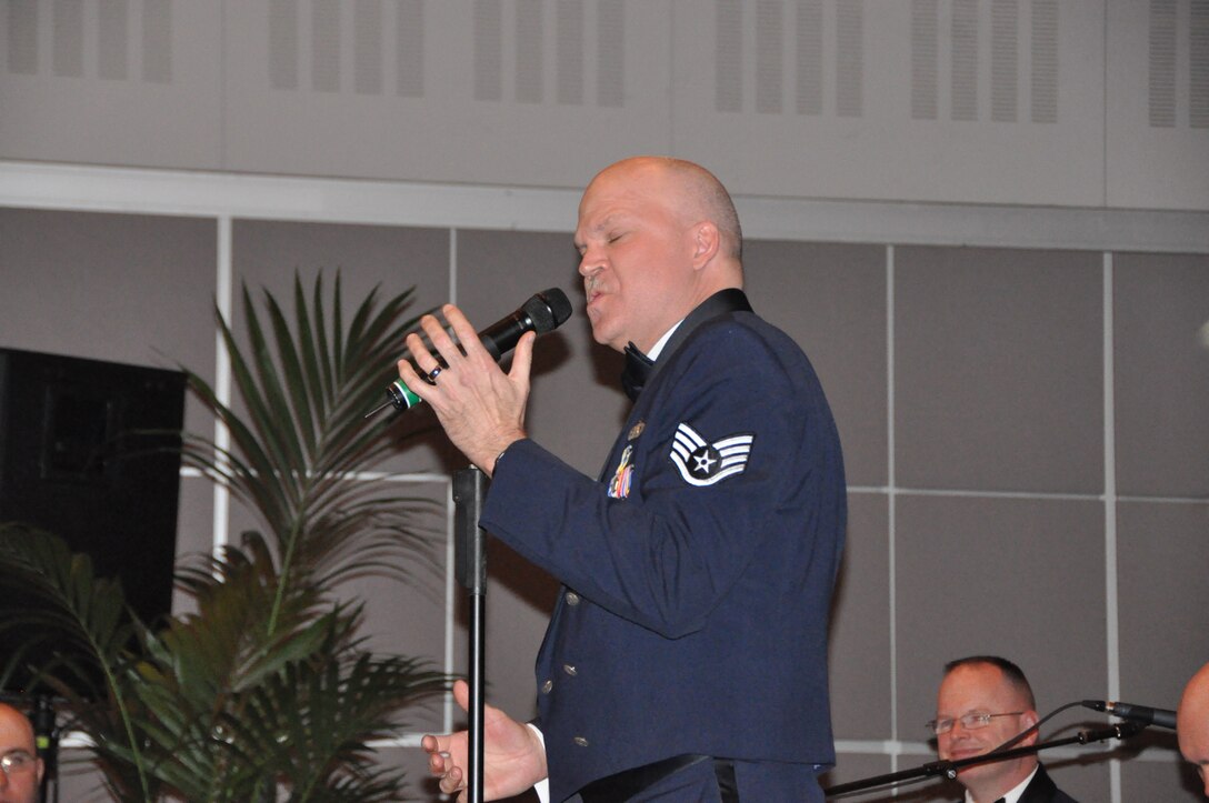SSGT Keenom sings "Let the good times roll" and has everyone on their feet!