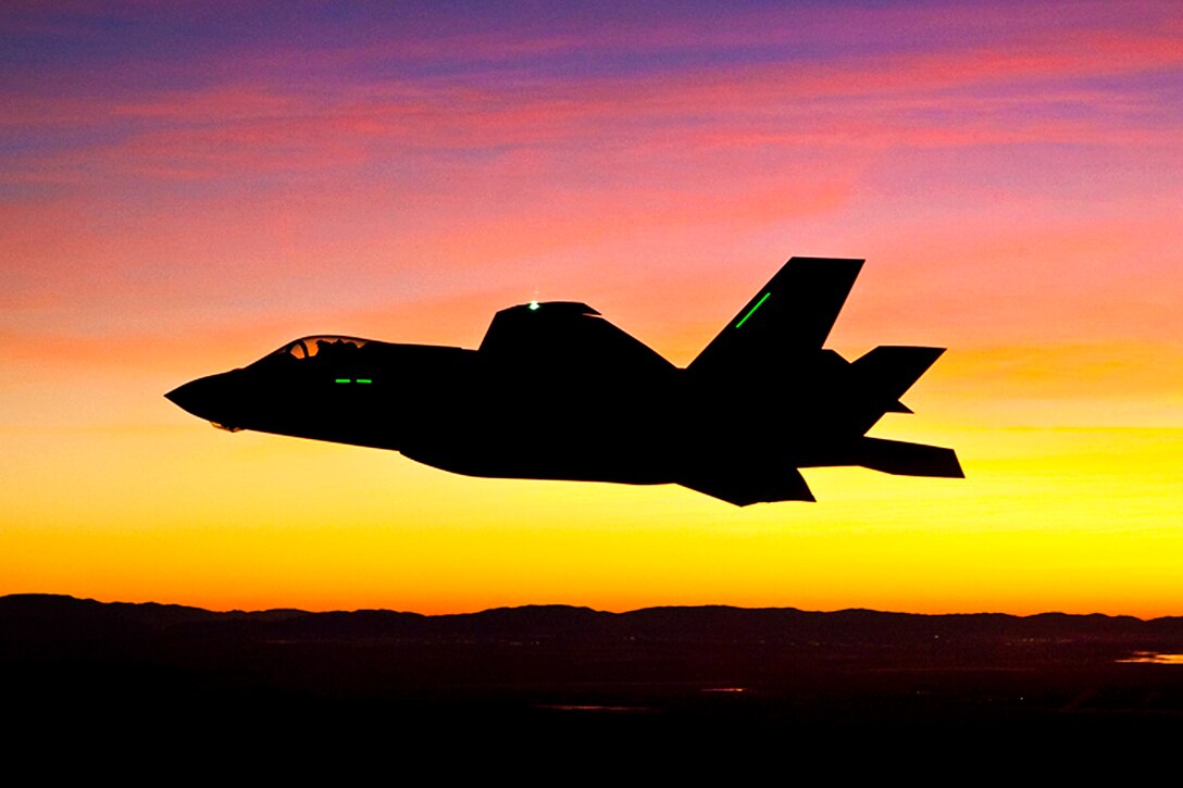 Mark Ward, a Lockheed Martin test pilot, performs the first night flight for the F-35 Joint Strike Fighter over Edwards Air Force Base, Calif., Jan. 18, 2012.