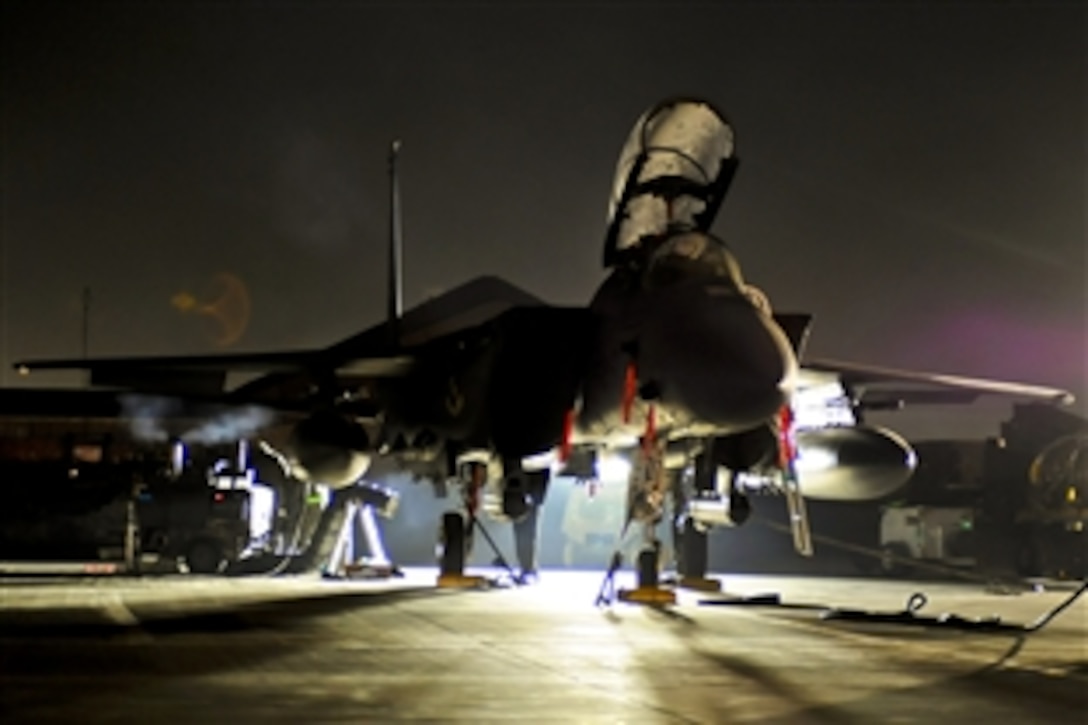 A U.S. Air Force F-15E Strike Eagle receives early morning maintenance on Bagram Airfield, Afghanistan, Jan. 28, 2012. The aircraft provides close air support to coalition forces. The crew and aircraft are deployed from Seymour Johnson Air Force Base, S.C.