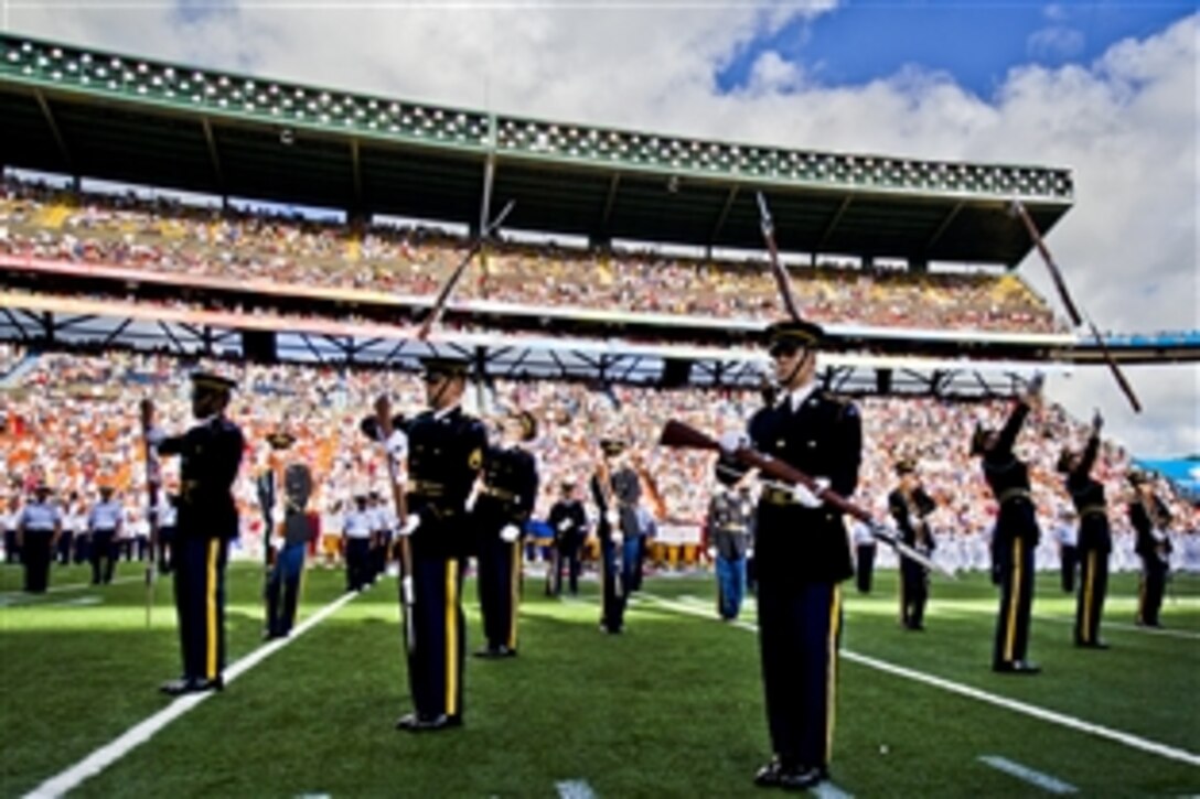Soldiers assigned to the U.S. Army Silent Drill Team perform at Aloha Stadium during the 2012 National Football League Pro Bowl halftime show in Honolulu, Jan. 29, 2012. The event honored several hundred service members assigned to bases throughout Hawaii.