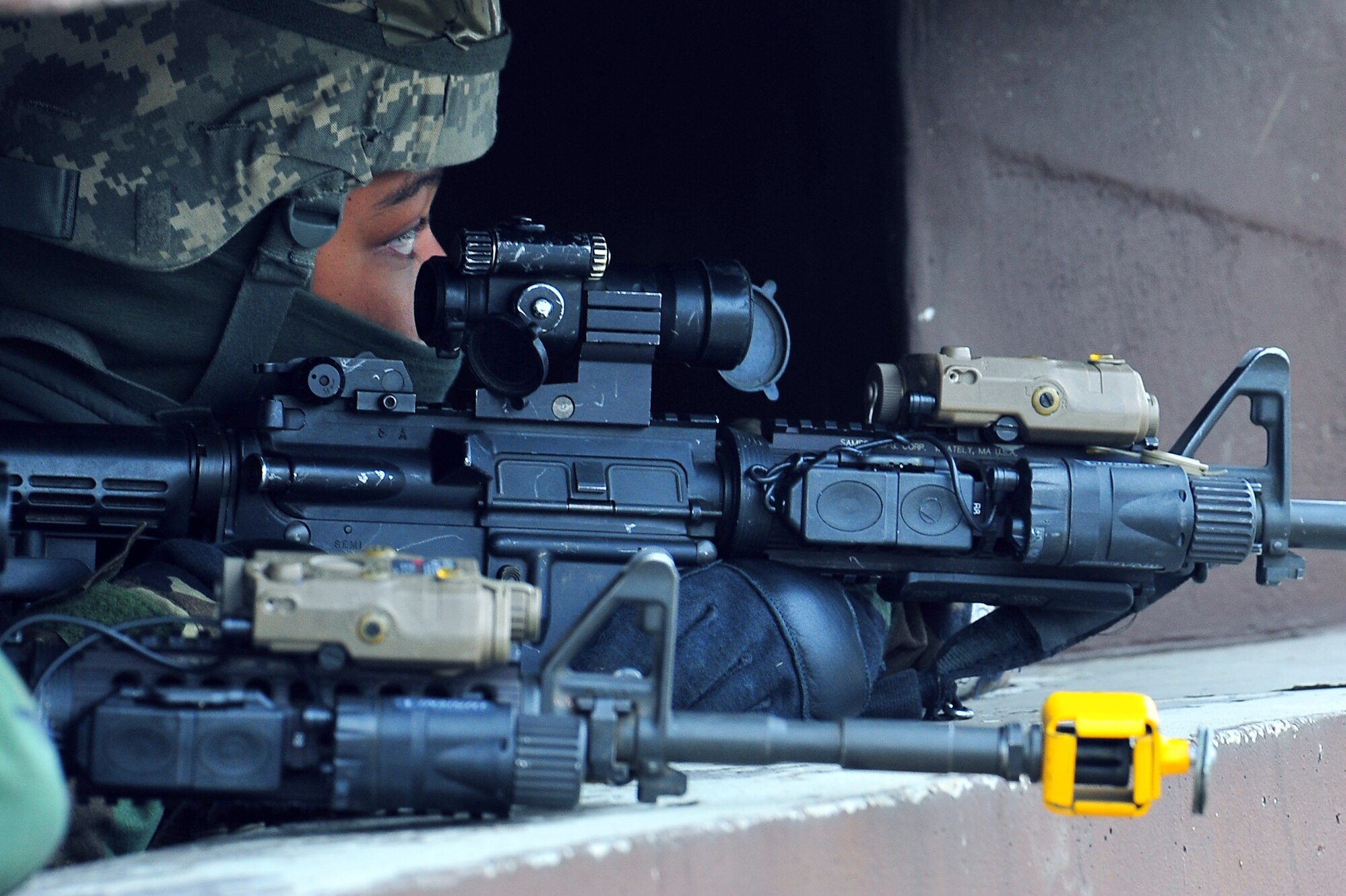 Senior Airman Nicol Hadnot, 51st Security Forces Squadron patrolman, watches for intruders during an exercise at Osan Air Base Jan. 31, 2012. Security forces patrolmen are charged with defending Airmen and base assets from terrorist activity. The Airmen are participating in a peninsula-wide operational readiness exercise, Beverly Bulldog 12-01, held to train U.S. forces throughout South Korea. (U.S. Air Force photo/Staff Sgt. Stefanie Torres)