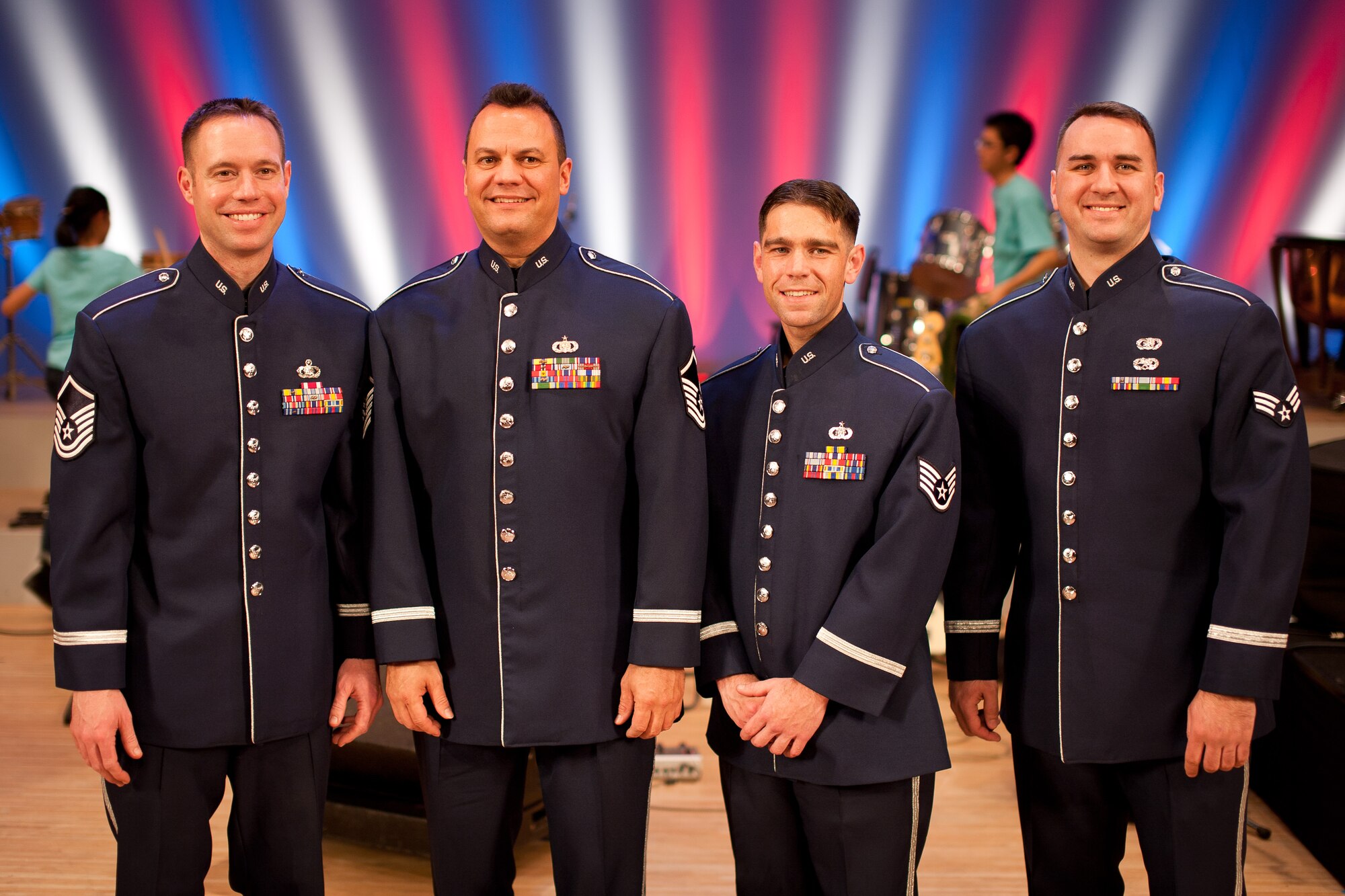 HAMURA CITY, Japan -- Final Approach, Band of the Pacific-Asia jazz group, poses for a photograph after the Japan-U.S. Joint Concert at the Yutorogi Learning Center, Hamura City, Japan, Jan. 28, 2012. Final Approach received many requests for pictures after the show. (U.S. Air Force photo/Staff Sgt. Josh Voyles)
