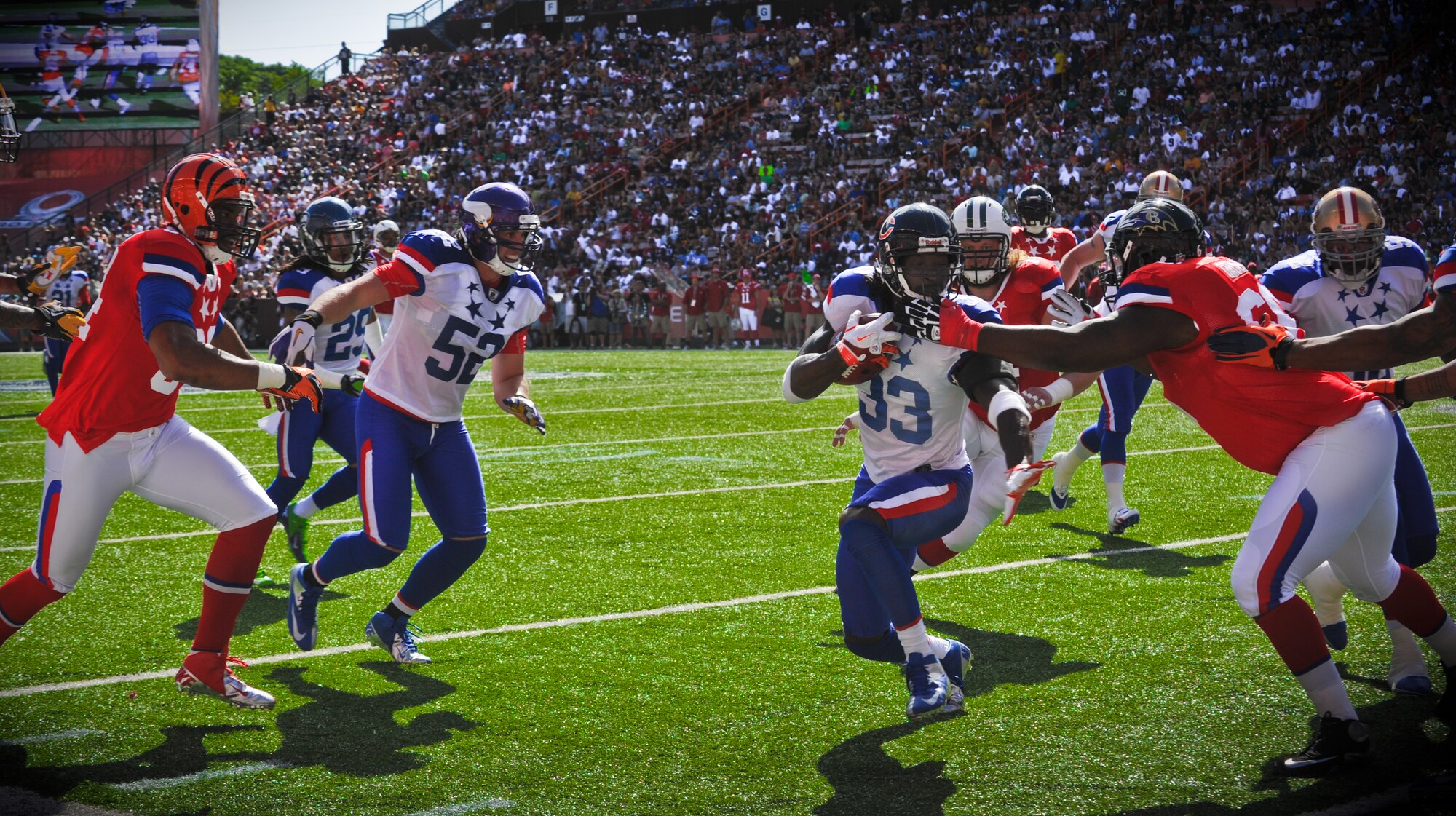Charles Tilman,  defense for the Chicago Bears,  runs the ball down the field during the 2012 Pro Bowl at Aloha Stadium in Honolulu, Hawaii, Jan. 29. (U.S. Air Force photo/Senior Airman Lauren Main)