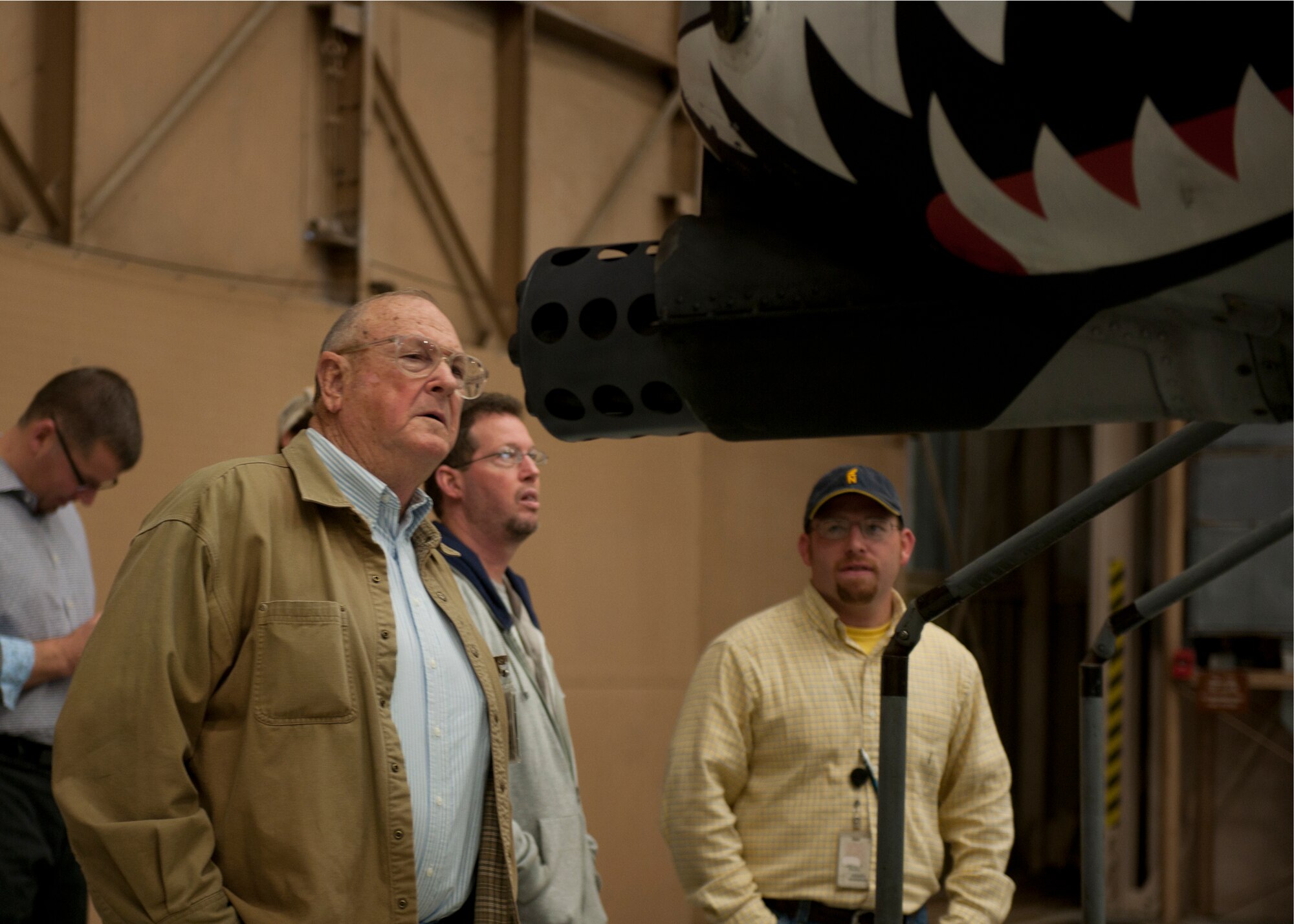 Members of the 402d Electronics Maintenance Group out of Robins Air Force Base, Ga., examines the A-10C Thunderbolt II, one of the aircraft the 402d EMG provides maintenance for at Moody Air Force Base, Ga., Jan. 27, 2012. Members of the 402d EMXG spent the day learning about the capabilities of the A-10 from pilots and maintenance members . (U.S. Air Force photo by Senior Airman Eileen Meier/Released)