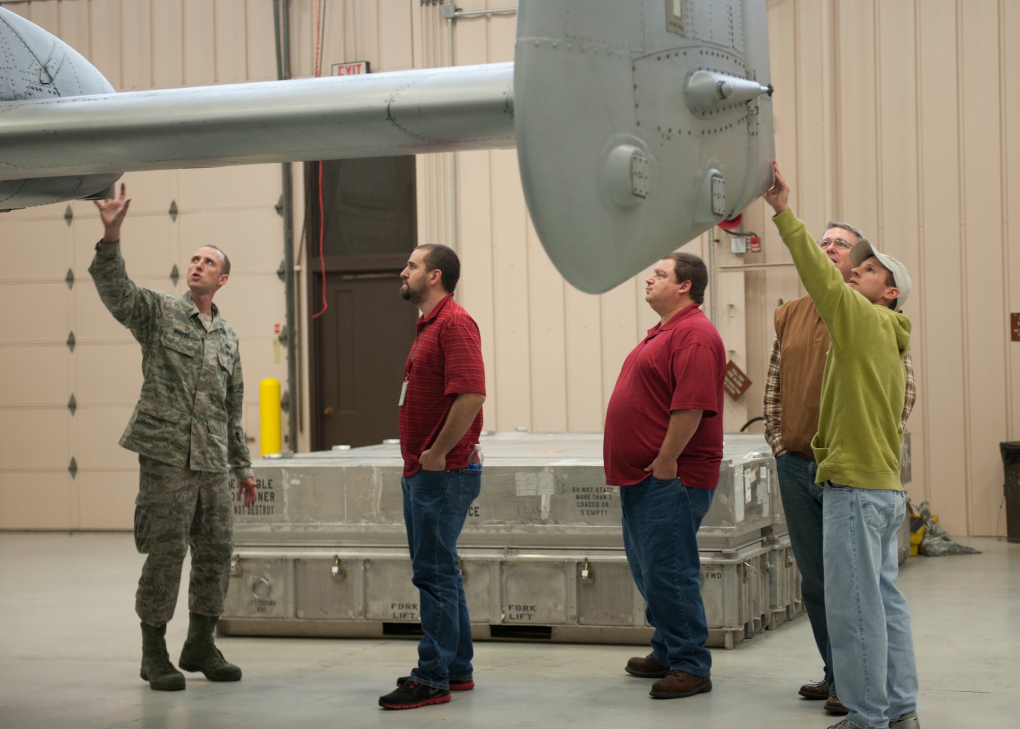 U.S. Air Force 1st Lt. Joel Murphy, 23d Aircraft Maintenance Squadron, shows the 402d Electronics Maintenance Group out of Robins Air Force Base, Ga., the wing of an A-10C Thunderbolt II at Moody Air Force Base, Ga., Jan. 27, 2012. The 402d EMXG is the largest avionics group in the Air Force. They provide combat-ready avionics parts, services and equipment repair for aircraft such as the A-10. (U.S. Air Force photo by Senior Airman Eileen Meier/Released)