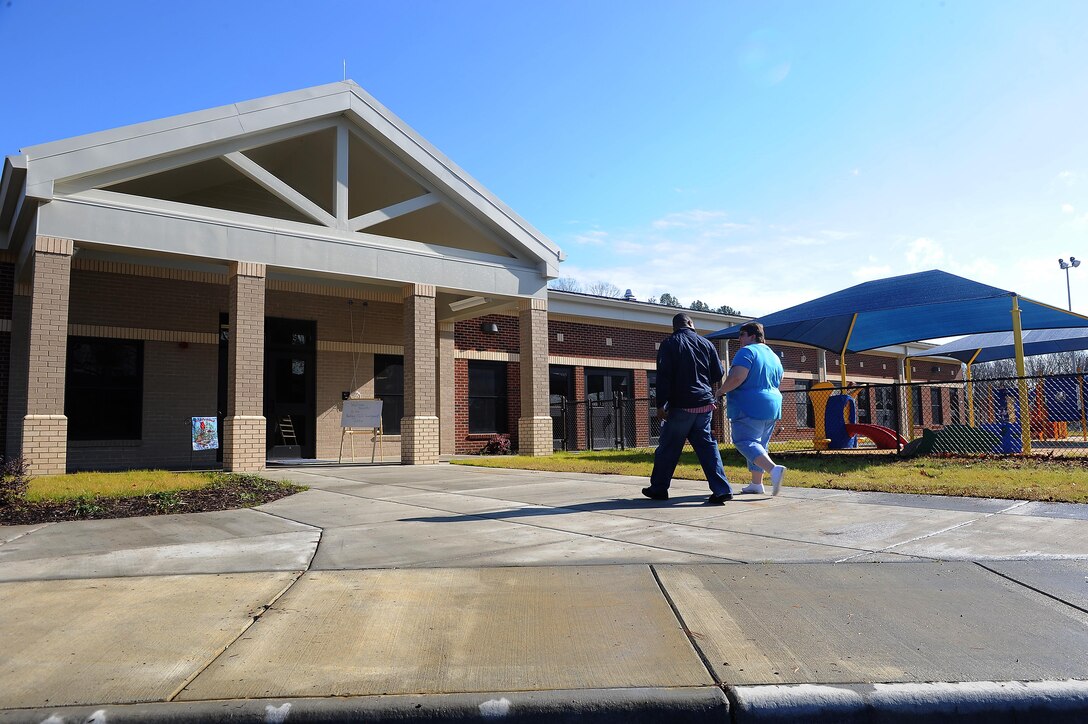 Eustis families take a tour of the new Pershing Child Development Center at Fort Eustis Jan. 27. The new facility was built to alleviate the long wait list for families to get their children enrolled. (U.S. Air Force photo by Staff Sgt. Antoinette Gibson/Released)