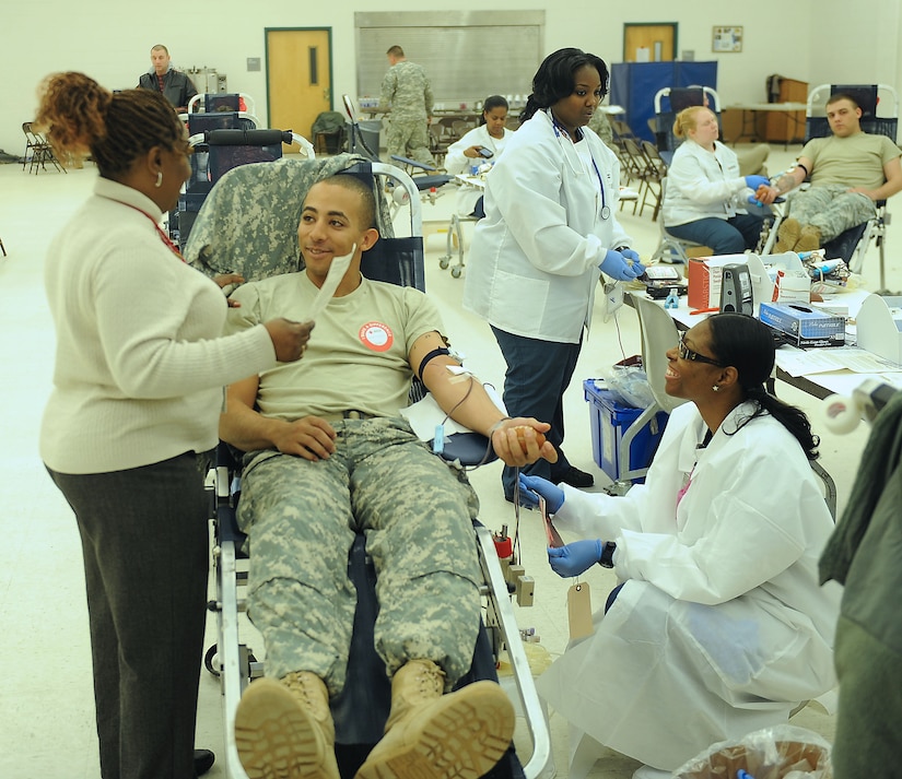 U.S. Army Spc. Ondirae Abdullah-Robinson, 359th Inland Cargo Transfer Company specialist, donates blood during an annual blood drive at Fort Eustis Jan. 27. The McDonald Army Health Center and other Military Treatment Facilities received credit for free blood units from American Red Cross to support our Soldiers and beneficiaries. (U.S. Air Force photo by Staff Sgt. Antoinette Gibson/Released)