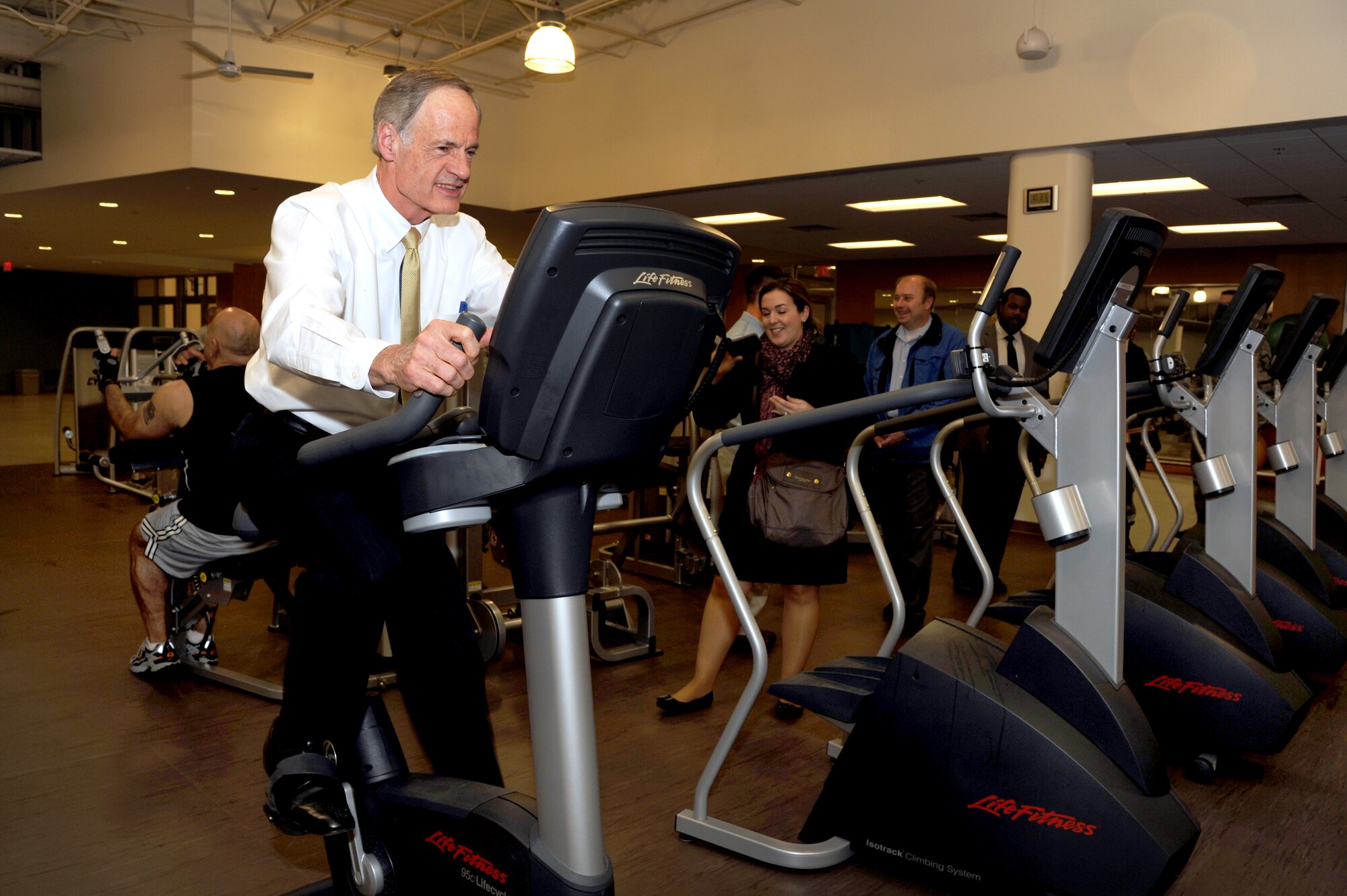 Tom Carper, U.S. senator for Delaware, tests out the new exercise equipment
during a tour of the new fitness center Jan. 27, 2012 at Dover Air Force
Base, Del. (U.S. Air Force photo By Master Sgt. Jeanette Spain)

