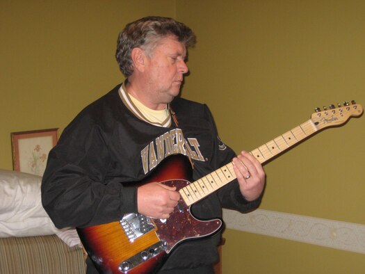 Bob Lindeman gets in the mood as he plays a Jimmy Buffet tune on a Fender Telecaster electric guitar. (Photo provided)