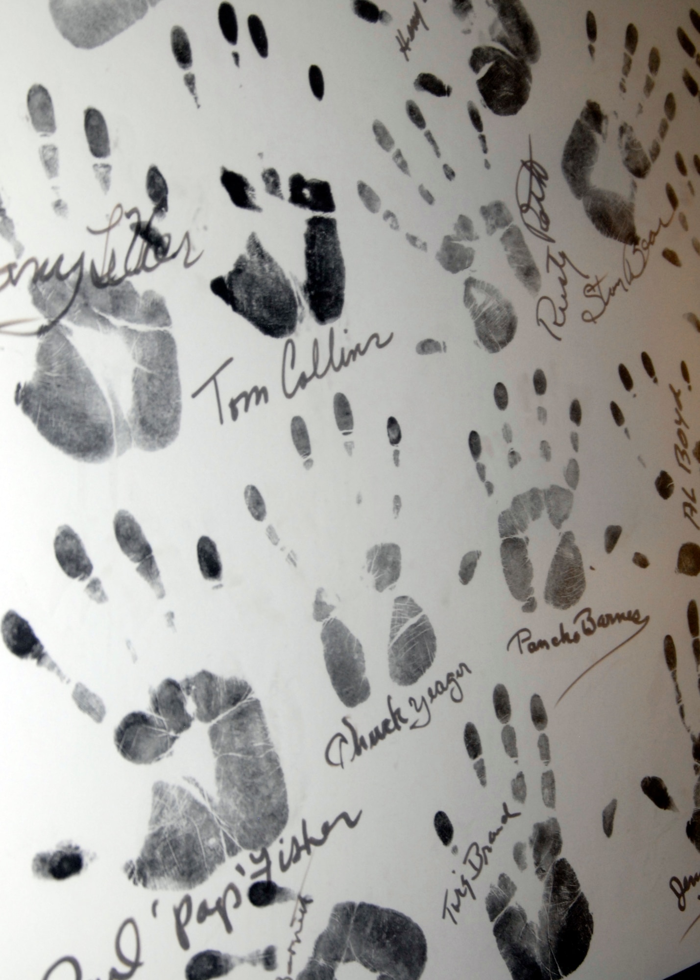 During the First Citizen of Edwards Day celebration in 1964, Pancho Barnes and her closest friends left their signatures and handprints on three historic panels. Chuck Yeager and Pancho Barnes' handprints can be seen directly next to each other. (U.S. Air Force Photo by Laura Mowry) 
