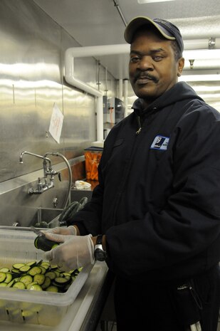 Nathan Brown,  who is legally blind, preps vegetables to be served at the Joint Base Charleston – Weapons station  galley, Jan. 25. Brown will receive the national William M. Usdane award in May. The Usdane Award is presented to individuals with significant disabilities who have exhibited outstanding achievement and exceptional character as employees of the AbilityOne Program. AbilityOne  is a federal initiative that helps people who are blind or have other significant disabilities find employment by working within a national nonprofit agency that sell products and services to the U.S. government. (U.S. Navy photo/Petty Officer 1st Class Jennifer Hudson)