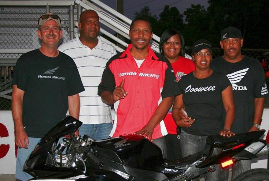 From left, Jason Kelly, Maurice Taylor, James Simmons, Keawanna Edminston, Sarah Reed and Charles Reed pose for a photo at Nashville’s Music City Raceway after Simmons, an ATA outside machinist at AEDC, placed first in the annual Pinky’s Labor Day Weekend Street Bike competition in September 2011. Kelly and Reed also work at AEDC. (Photo provided)