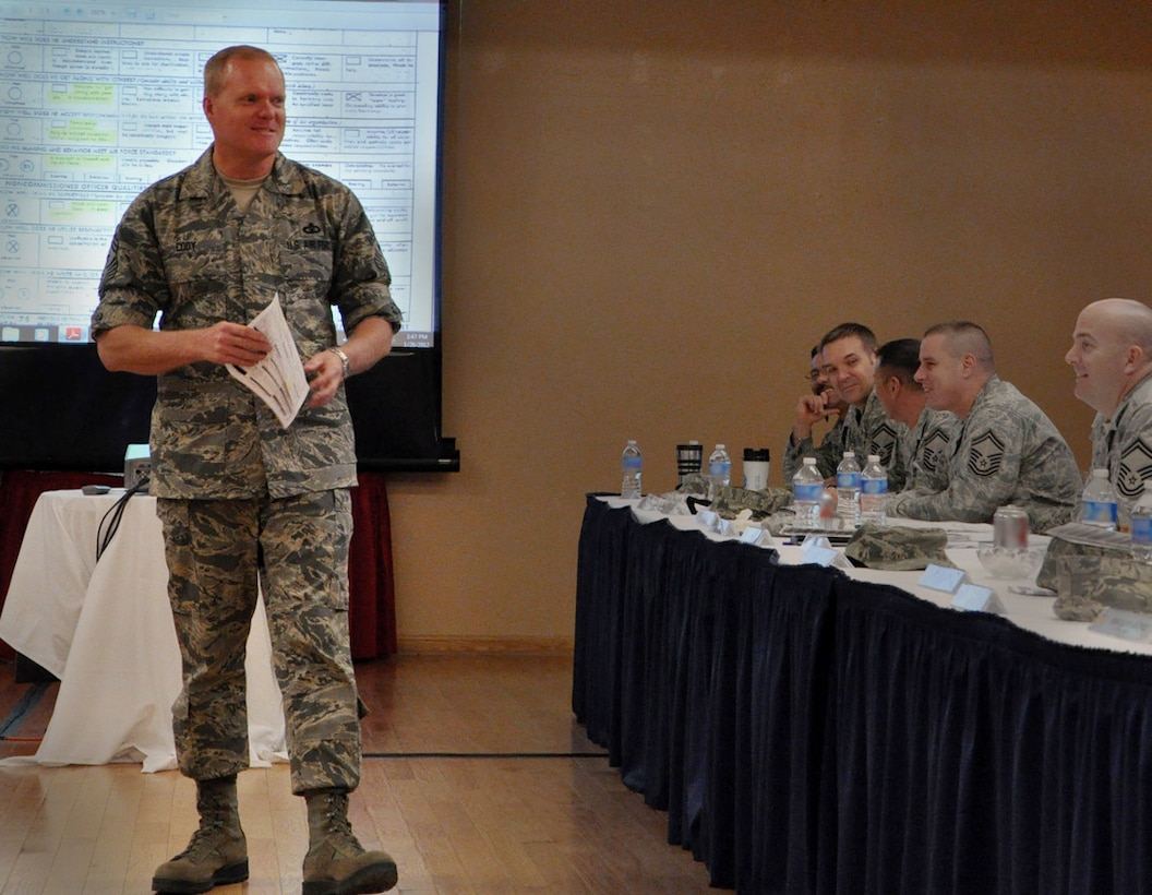 Command Chief Master Sgt. James Cody, Air Education and Training Command, discusses enlisted performance reports during the Chief Orientation Course at the Parr O'Club, Randolph Air Force Base, Texas, Jan. 26. Seventy-three new chiefs from AETC and other commands attended the four-day course. (U.S. Air Force photo/Staff Sgt. Clinton Atkins)