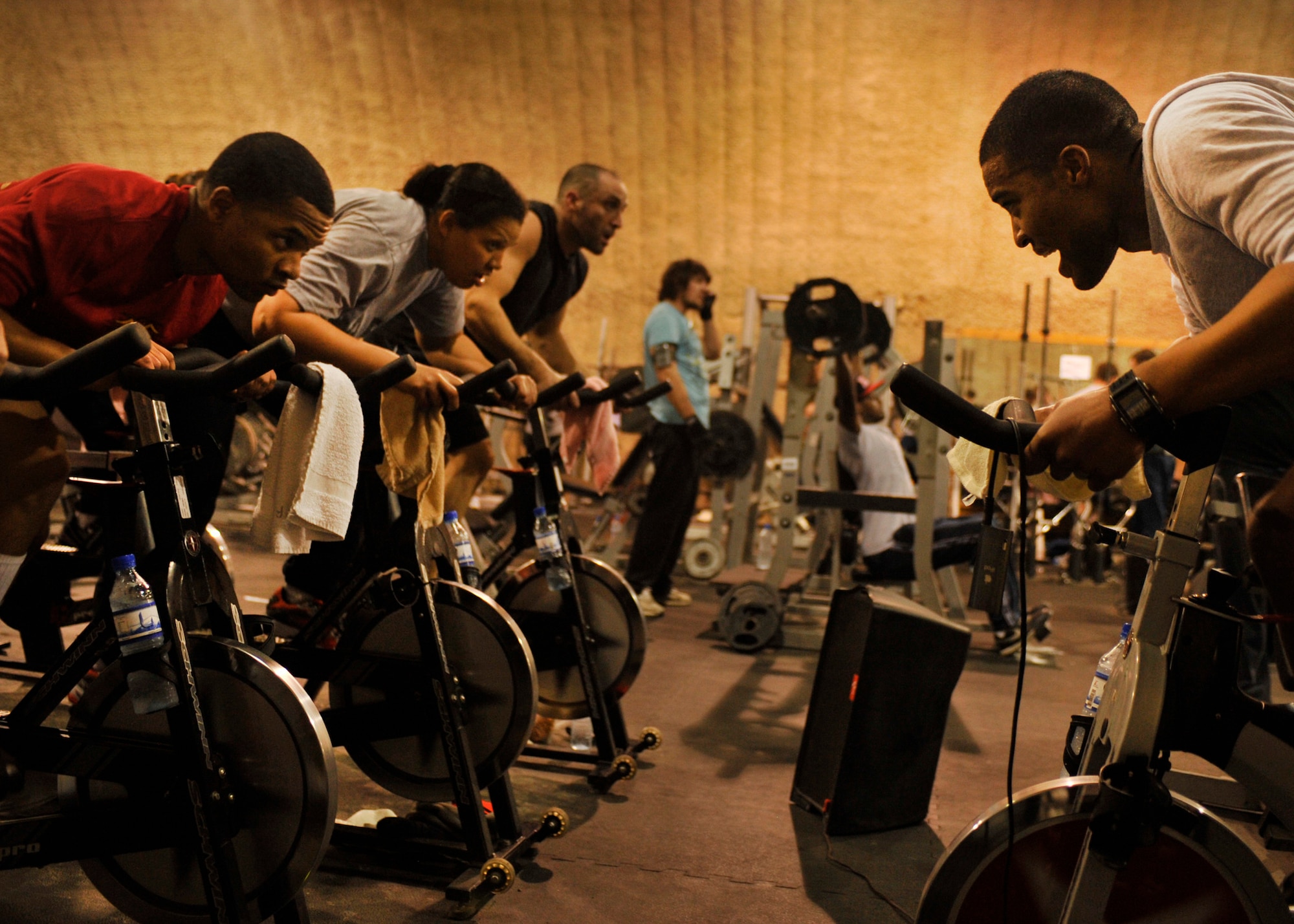 BAGRAM AIRFIELD, Afghanistan— Senior Airman Nicholas Gooden urges his spin class on at Bagram Airfield, Afghanistan, Jan. 30, 2012. Gooden is a vehicle maintainer with the 455 Expeditionary Logistics Readiness Squadron and is deployed from Aviano Air Base, Italy. (U.S. Air Force photo/Airman 1st Class Ericka Engblom) 

