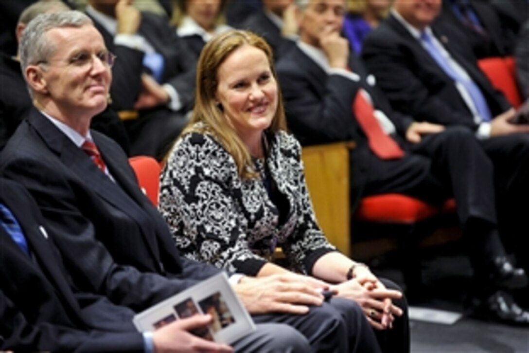 Michele Flournoy, undersecretary of defense for policy, smiles as Defense Secretary Leon E. Panetta thanks her for her service during a farewell ceremony in her honor at the Pentagon, Jan. 30, 2012.