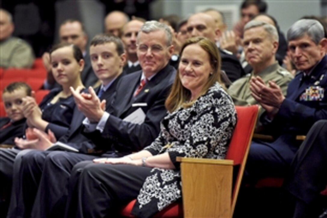 Michele Flournoy, undersecretary of defense for policy, smiles as Defense Secretary Leon E. Panetta thanks her for her service during a farewell ceremony in her honor at the Pentagon, Jan. 30, 2012.