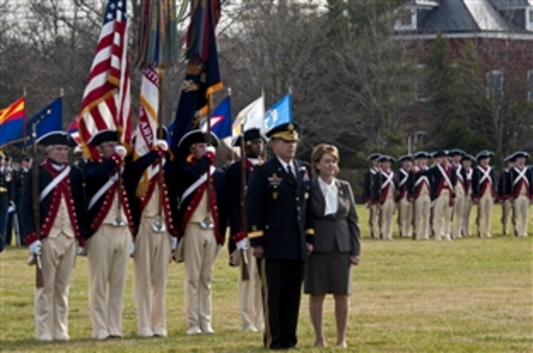 Army Vice Chief of Staff Gen. Peter W. Chiarelli and his wife, Beth, stand before the Continental Color Guard during his retirement ceremony on Joint Base Myer-Henderson Hall in Arlington, Va.,  Jan. 31, 2012.