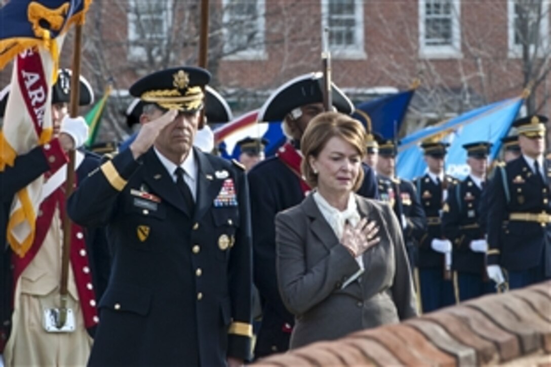Army Vice Chief of Staff Gen. Peter W. Chiarelli salutes as the national anthem plays during his retirement ceremony on Joint Base Myer-Henderson Hall in Arlington, Va., Jan. 31, 2012. Chiarelli's wife, Beth, joined him.