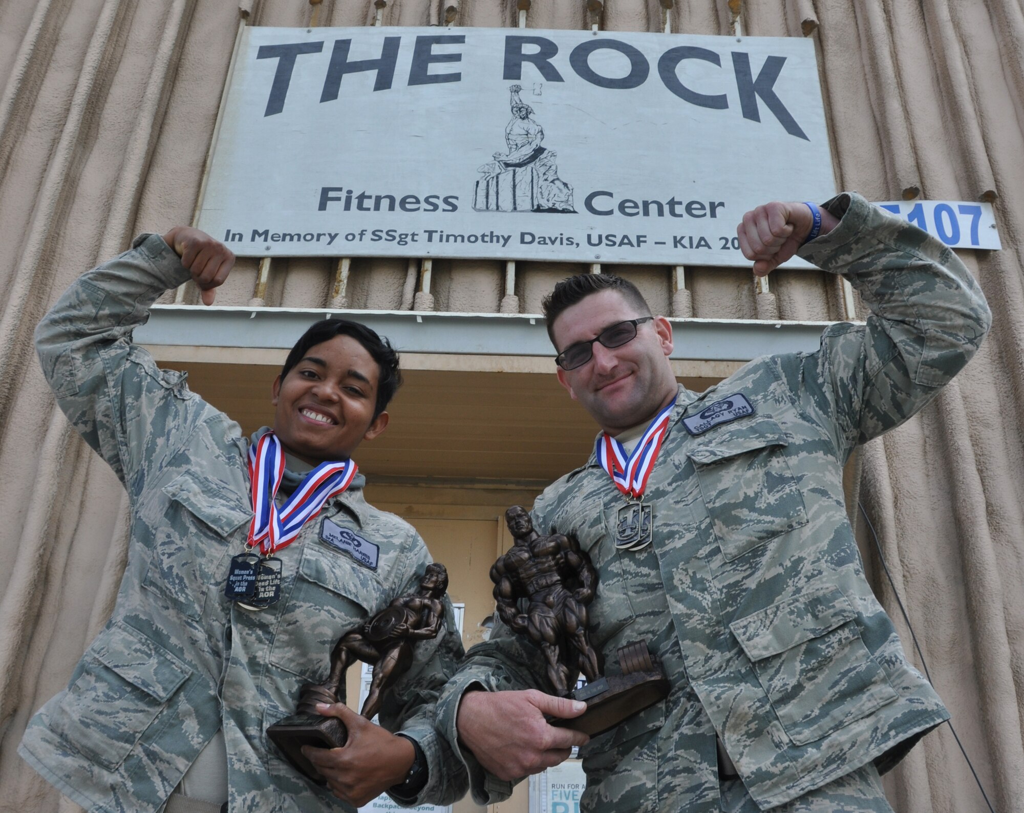 TSgt Ryan Callagy and SrA Melanie Harris, both members of 455th Expeditionary Civil Engineer Squadron, Bagram Airfield, Afghanistan, recently bested more than 40 total competitors from bases throughout the region to earn the title "strongest in the AOR." (U.S. Air Force photo/TSgt Shawn McCowan)