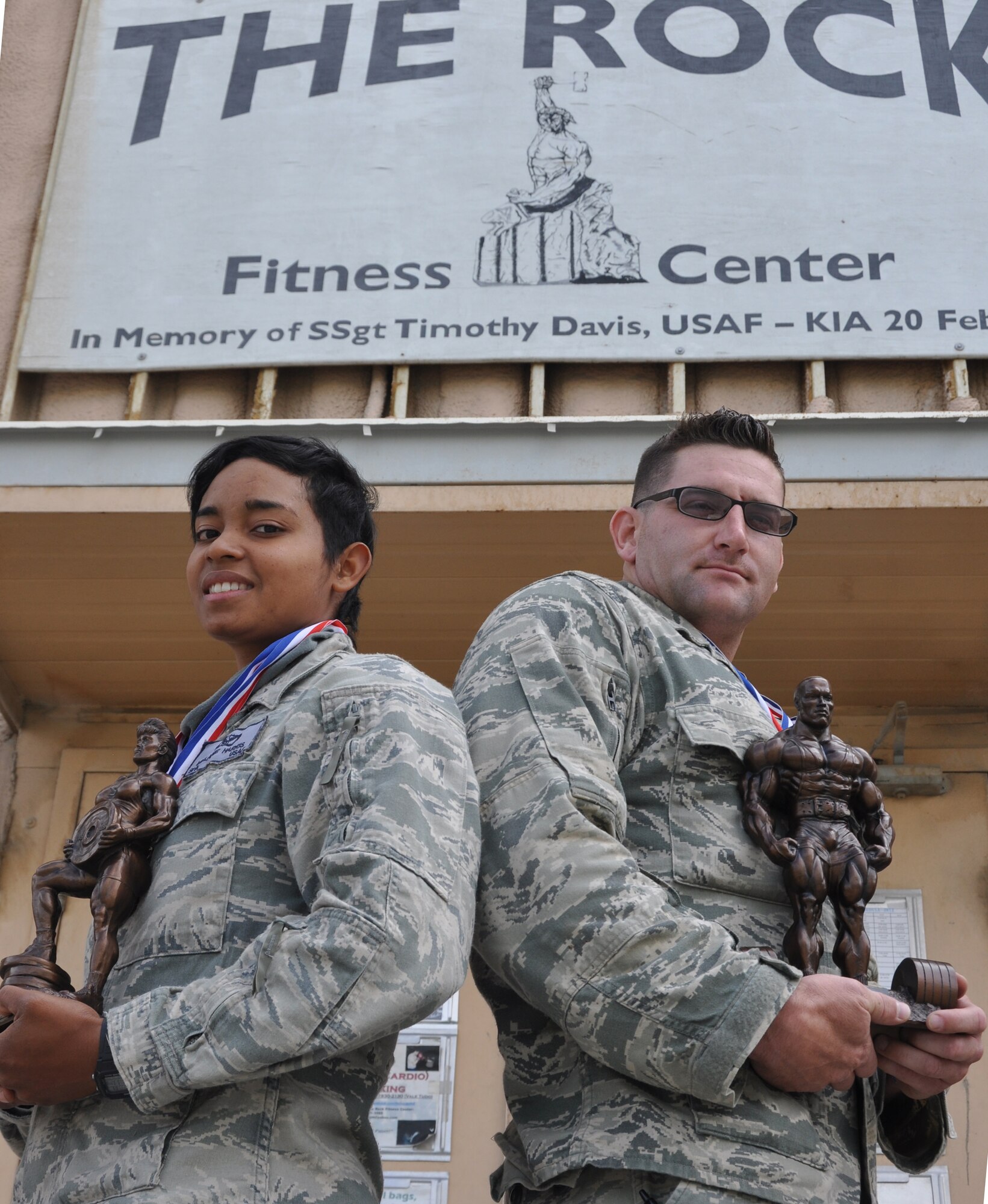 TSgt Ryan Callagy and SrA Melanie Harris, both members of 455th Expeditionary Civil Engineer Squadron, Bagram Airfield, Afghanistan, recently bested more than 40 total competitors from bases throughout the region to earn the title "strongest in the AOR." (U.S. Air Force photo/TSgt Shawn McCowan)