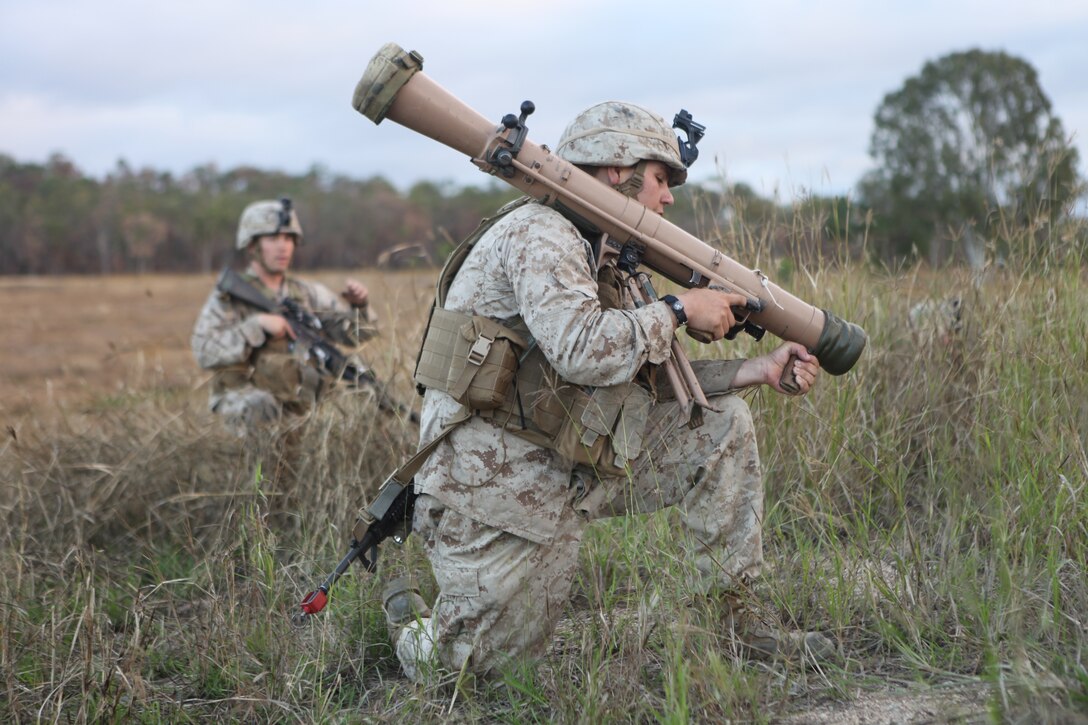 Marines with Company G., Battalion Landing Team 2nd Battalion, 1st Marines, 31st Marine Expeditionary Unit, conduct a response to contact drill here, June 30. The Marines of 3rd platoon with Weapons platoon reinforcements have set up in defensive positions in and around the simulated town of Raspberry Creek, in preparation for the advance of the Australian Army's 1st Brigade. The coming assault is one of the key battles of Exercise Hamel 2012, the multi-national training evolution between the Australian Army, U.S. Marines and New Zealand Army, serving as 1st Brigade's certification exercise. The 31st MEU is the only continuously forward-deployed MEU and is the nation's force in readiness in the Asia-Pacific region.
