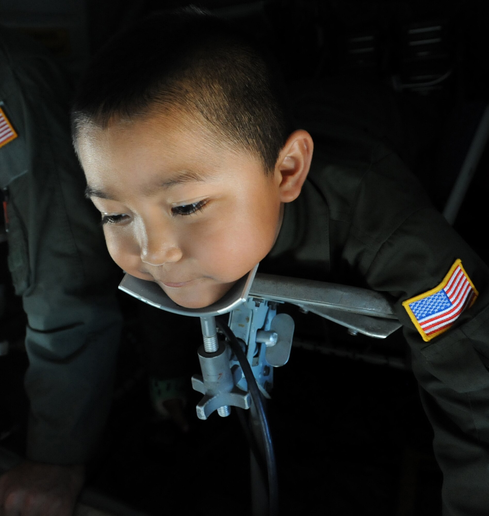Rosco Rebibis, a patient at Kapiolani Medical battling acute lymphoblastic leukemia, lies in the boom operator seat of a KC-135 Stratotanker June 29 as part of the Pilot for a Day program at Joint Base Pearl Harbor-Hickam, Hawaii. ALL is a cancer of the blood and bone marrow and is the most common type of cancer in children. (U.S.
Air Force photo by Staff Sgt. Nathan Allen)
