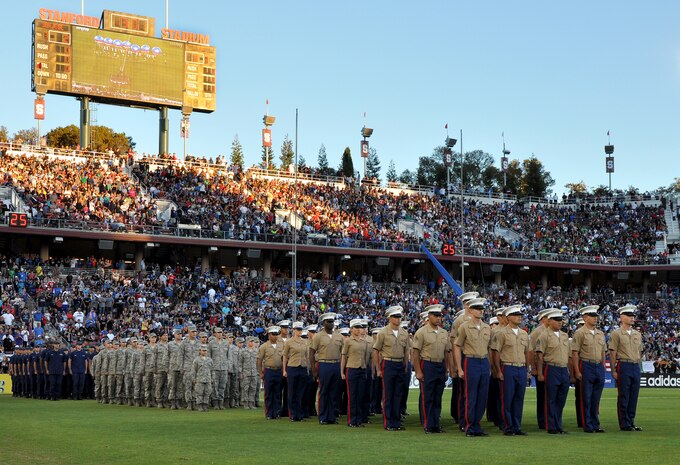 U.S. servicemembers line up in formation during the halftime show of the L.A. Galaxy versus San Jose Earthquakes soccer game at Stanford Stadium, Stanford, Calif., June 30, 2012. More than 50,000 soccer fans attended the game that honored the U.S. military during the halftime show. (U.S. Air Force photo by Staff Sgt. Robert M. Trujillo/Released)