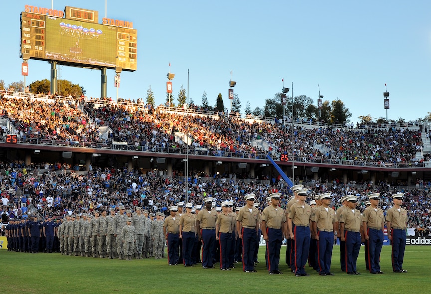 U.S. servicemembers line up in formation during the halftime show of the L.A. Galaxy versus San Jose Earthquakes soccer game at Stanford Stadium, Stanford, Calif., June 30, 2012. More than 50,000 soccer fans attended the game that honored the U.S. military during the halftime show. (U.S. Air Force photo by Staff Sgt. Robert M. Trujillo/Released)