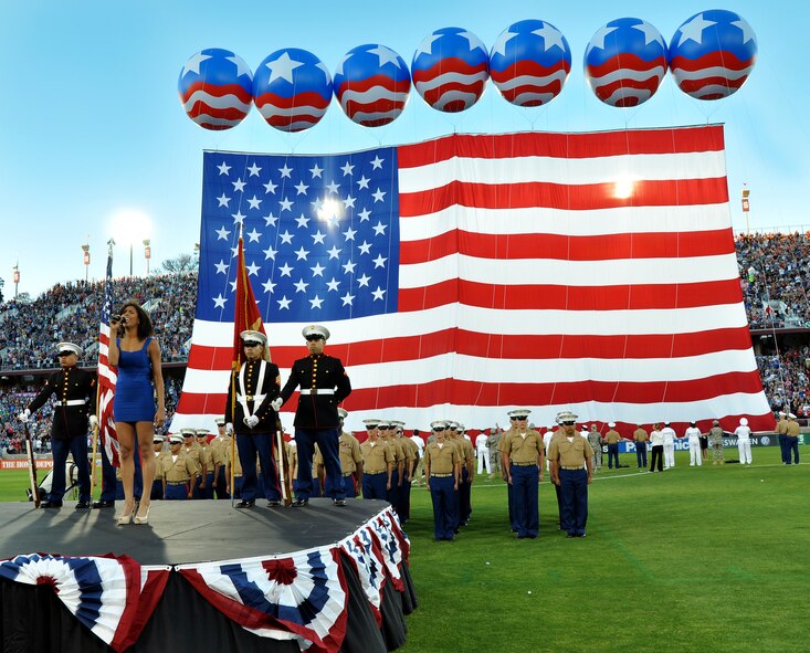 U.S. servicemembers line the field as God bless America is sung during the halftime show of the   L.A. Galaxy versus San Jose Earthquakes soccer game at Stanford Stadium, Stanford, Calif., June 30, 2012. More than 50,000 soccer fans attended the game that honored the U.S. military. (U.S. Air Force photo by Staff Sgt. Robert M. Trujillo/Released)