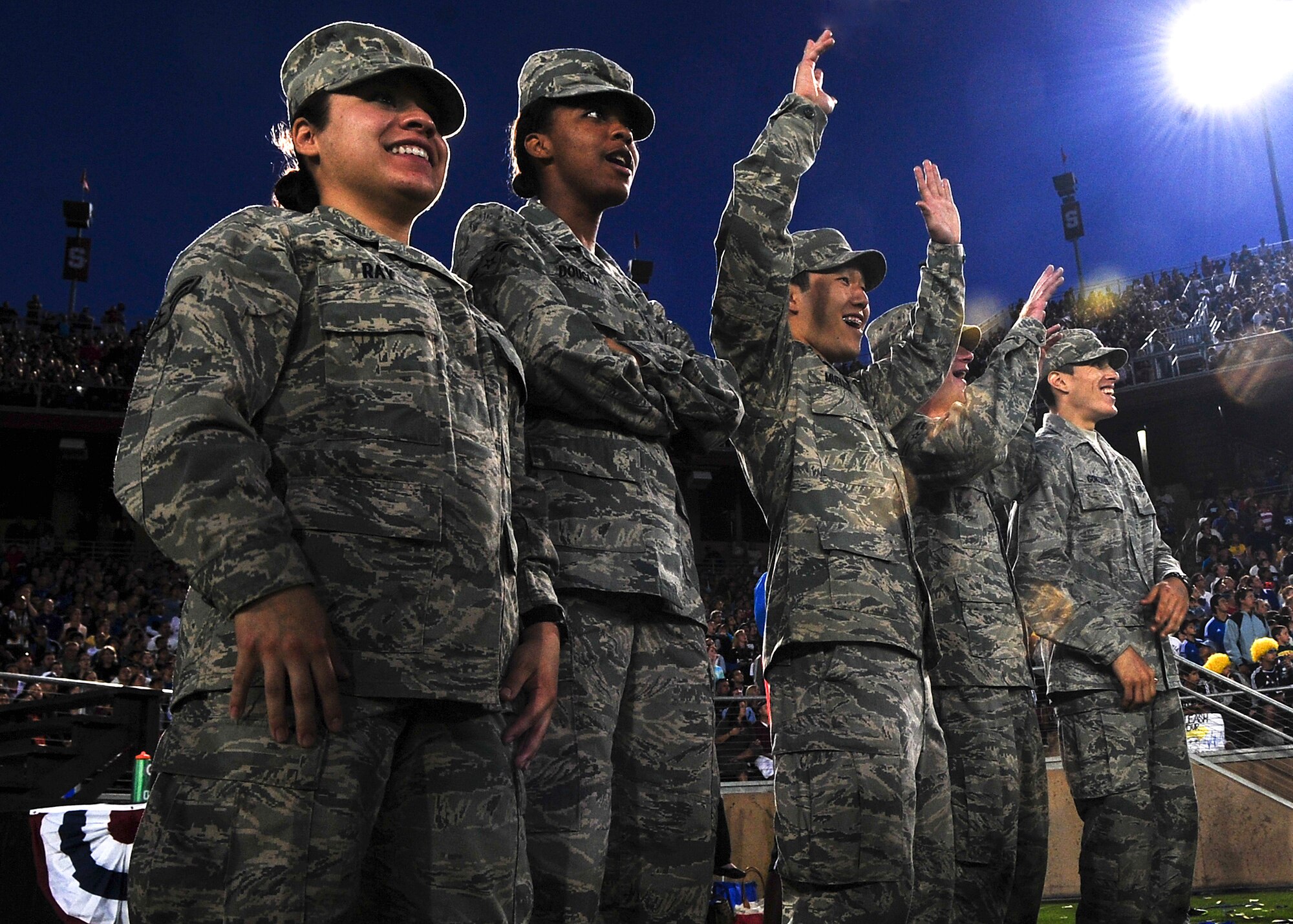 Members of Beale Air Force Base, Calif., cheer during the L.A. Galaxy versus San Jose Earthquakes game June 30 at Stanford University stadium. More than 300 servicemembers participated in the military appreciation night which highlighted the sacrifices troops make every day. (U.S. Air Force photo by Senior Airman Shawn Nickel)