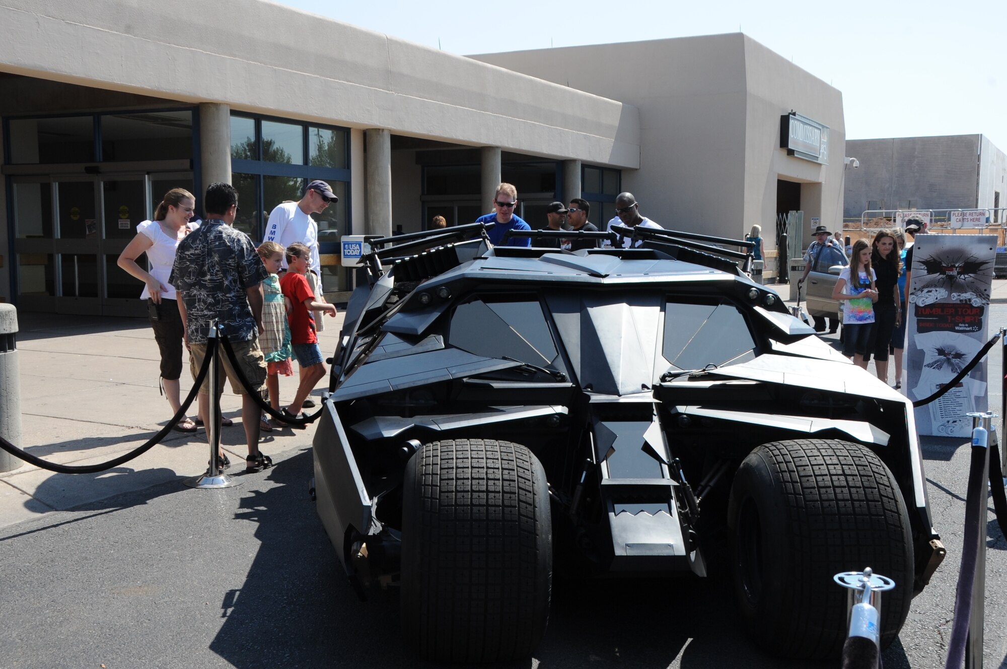 KIRTLAND AFB, N.M. -- The “Tumbler” and “Bat-Pod” stopped Sunday, July 1, at the Kirtland AFB commissary as part of a national tour by the vehicles from the upcoming Batman movie, “The Dark Knight Rises.”  (Photo by Dennis Carlson)
