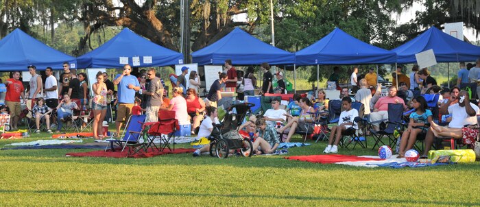 Nearly 1,500 Sailors, Airmen, civilians and their families attended the 2012 Freedom Fest June 29 at Marrington Plantation at Joint Base Charleston – Weapons Station. The event included food, drinks, festival rides, music and fireworks to celebrate 236 years of freedom. (U.S. Air Force photo/Airman 1st\ Class Jared Trimarchi)