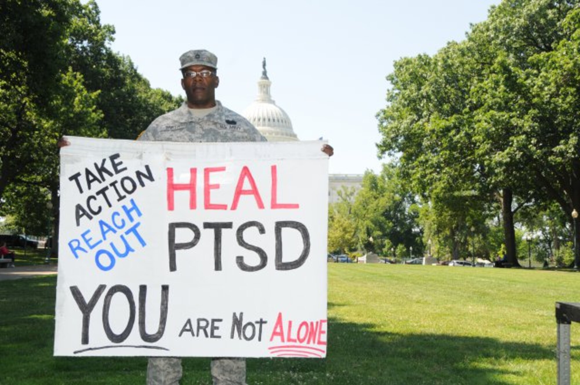 Sgt. 1st Class Kendrick J. Smith poses in front of the Capitol in Washington, D.C., June 27, 2012, for National Post-Traumatic Stress Disorder Awareness Day. (U.S. Army Courtesy Photo/Released)