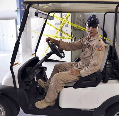 Brig. Gen. Karl McGregor was the guest speaker during the 912th ARS’s combat dining-in and prior to the start he helped off-load supplies for the event, held in Hangar 2306, June 15. (U.S. Air Force photo by Megan Crusher)
