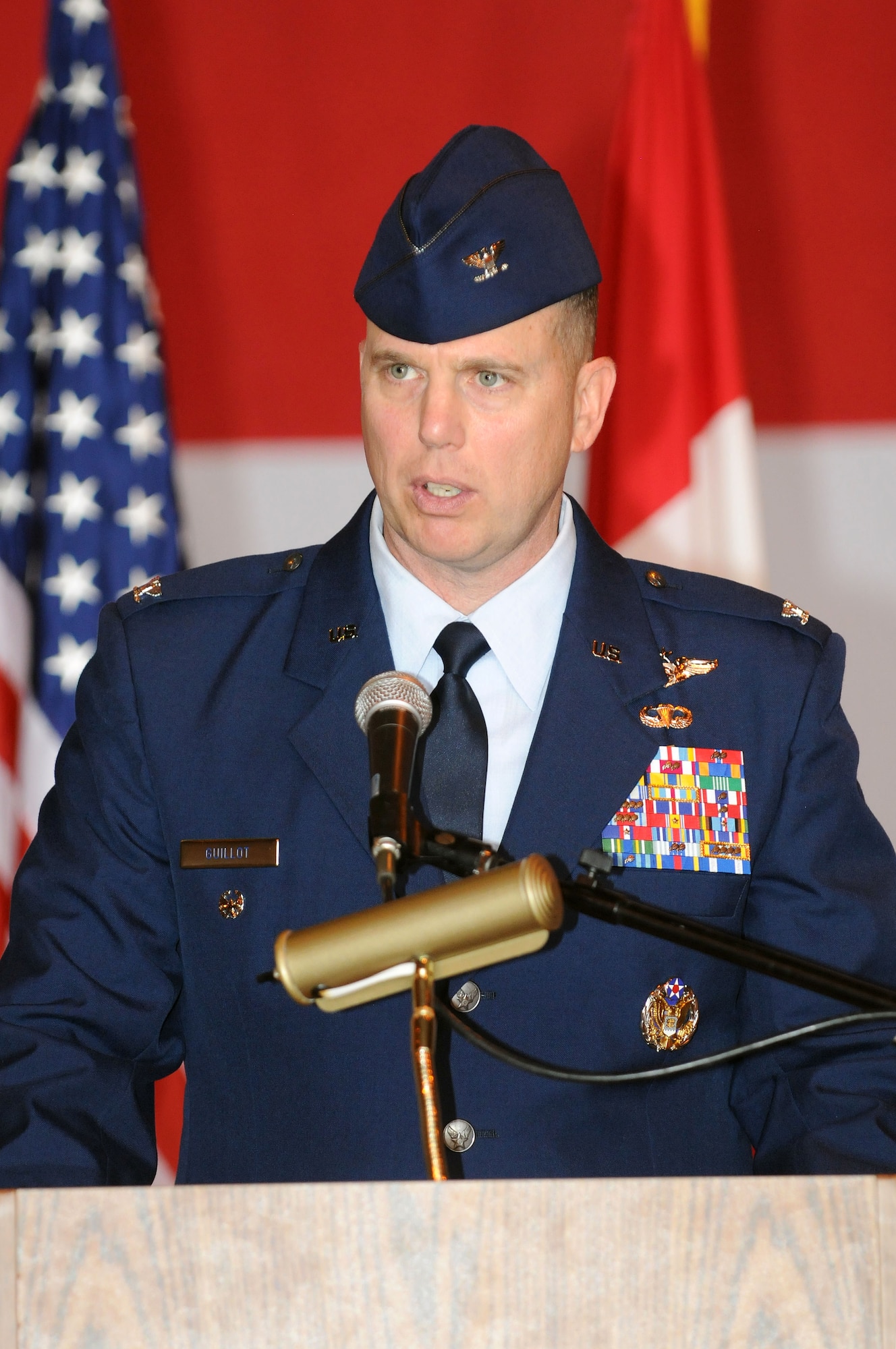 Col. Gregory M. Guillot addresses the crowd shortly after assuming command of the 552nd Air Control Wing during a ceremony June 21. (Air Force photo by David Faytinger)